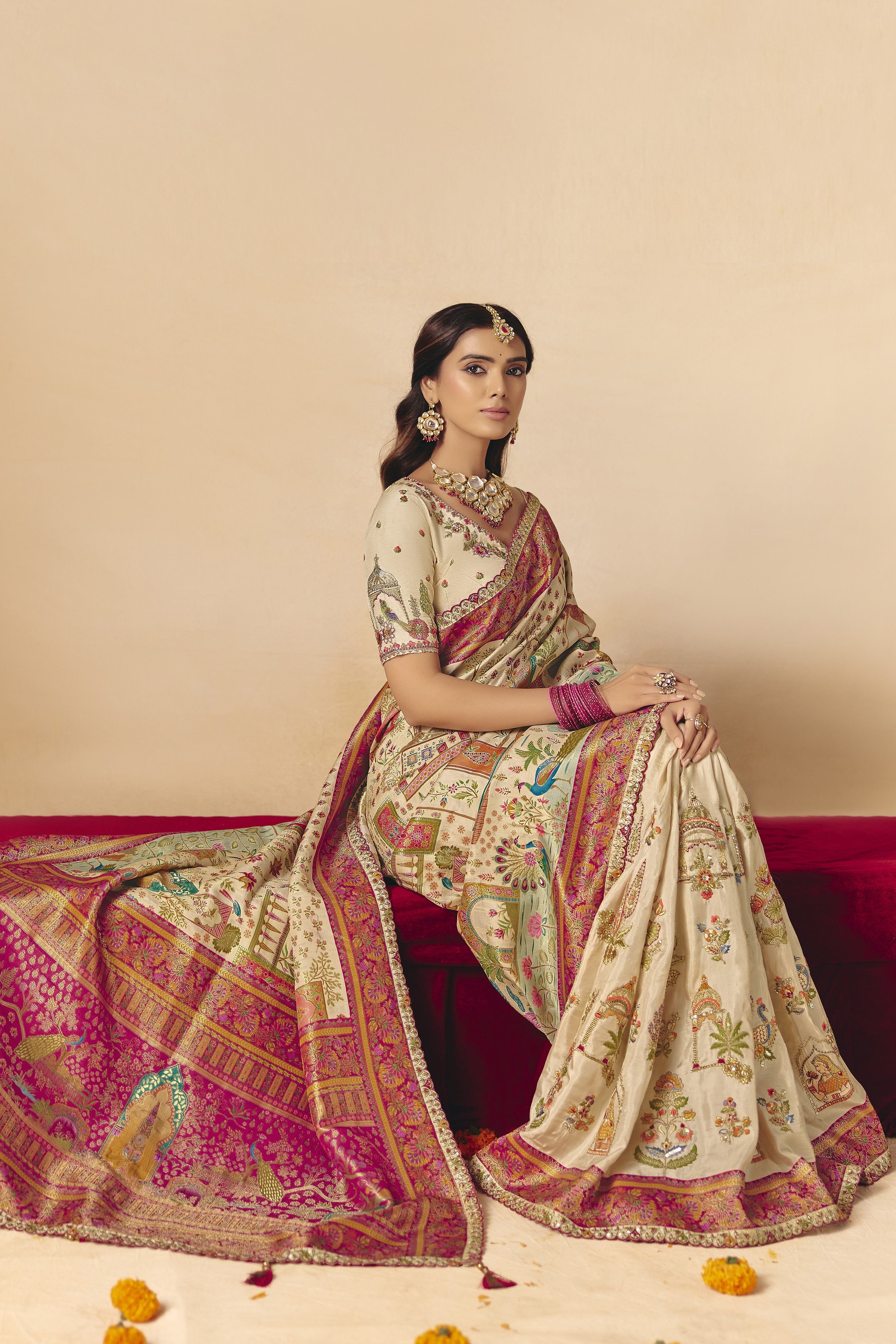 Creamy Beige Embellished Dola Silk Saree