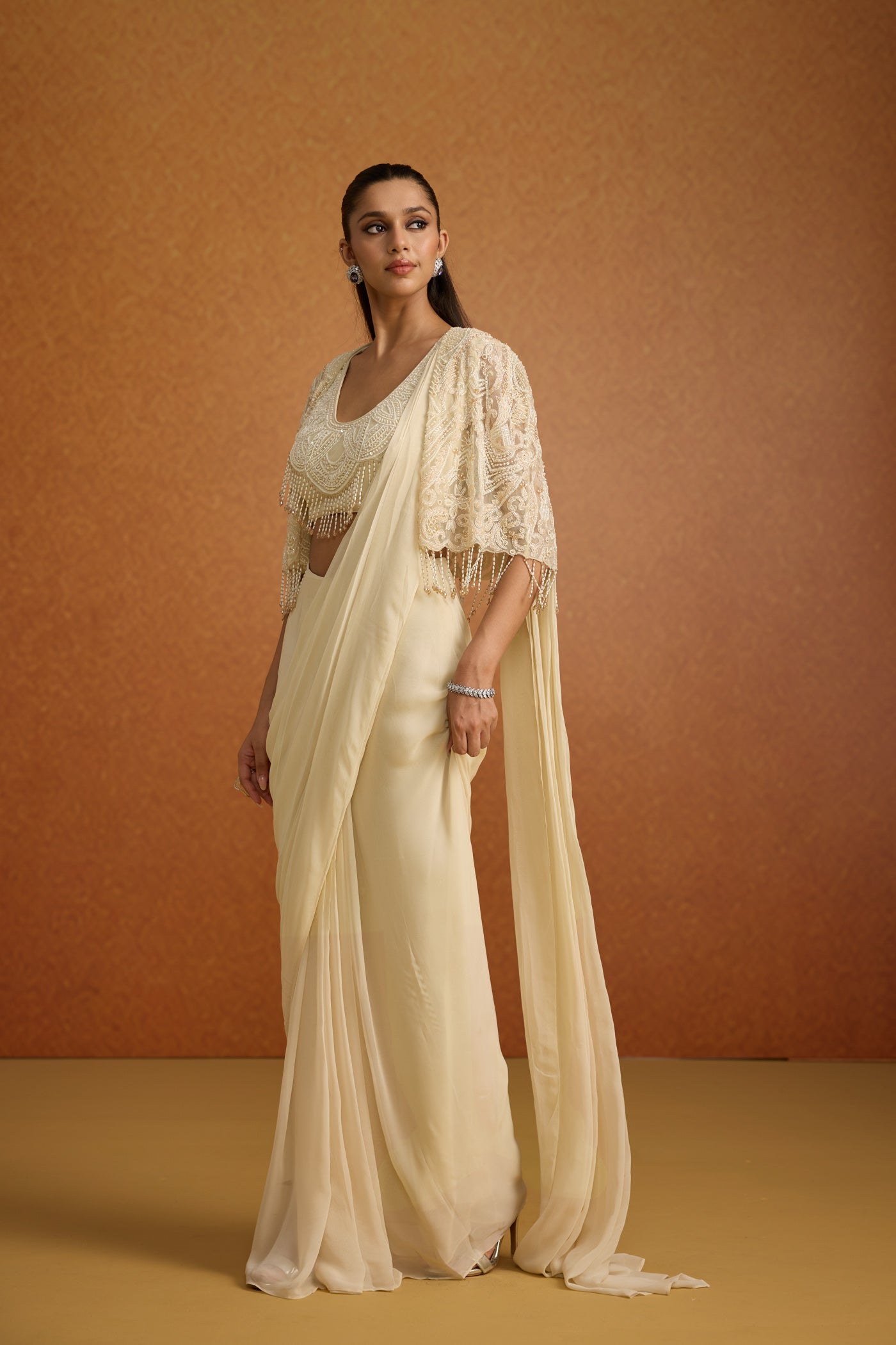 Ivory Embellished Soft Georgette Pre-Draped Saree