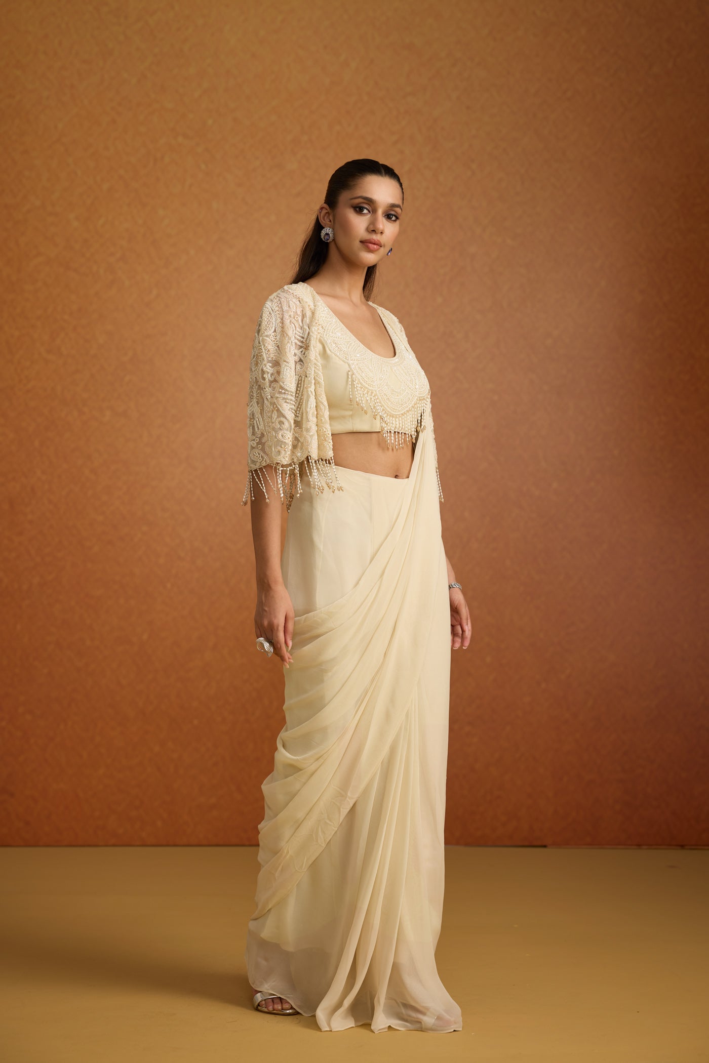 Ivory Embellished Soft Georgette Pre-Draped Saree