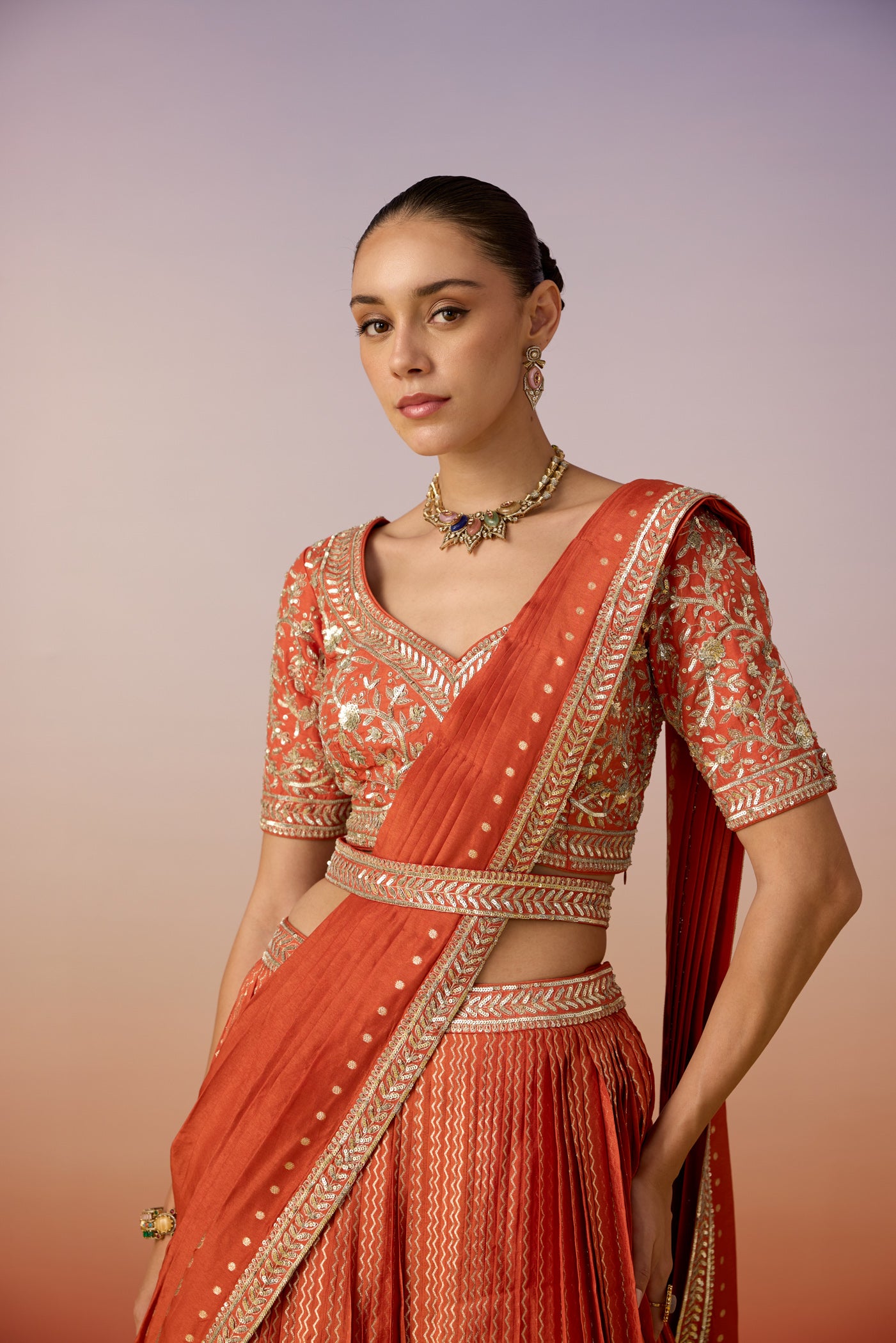 Rust Orange Embellished Crushed Silk Lehenga Set