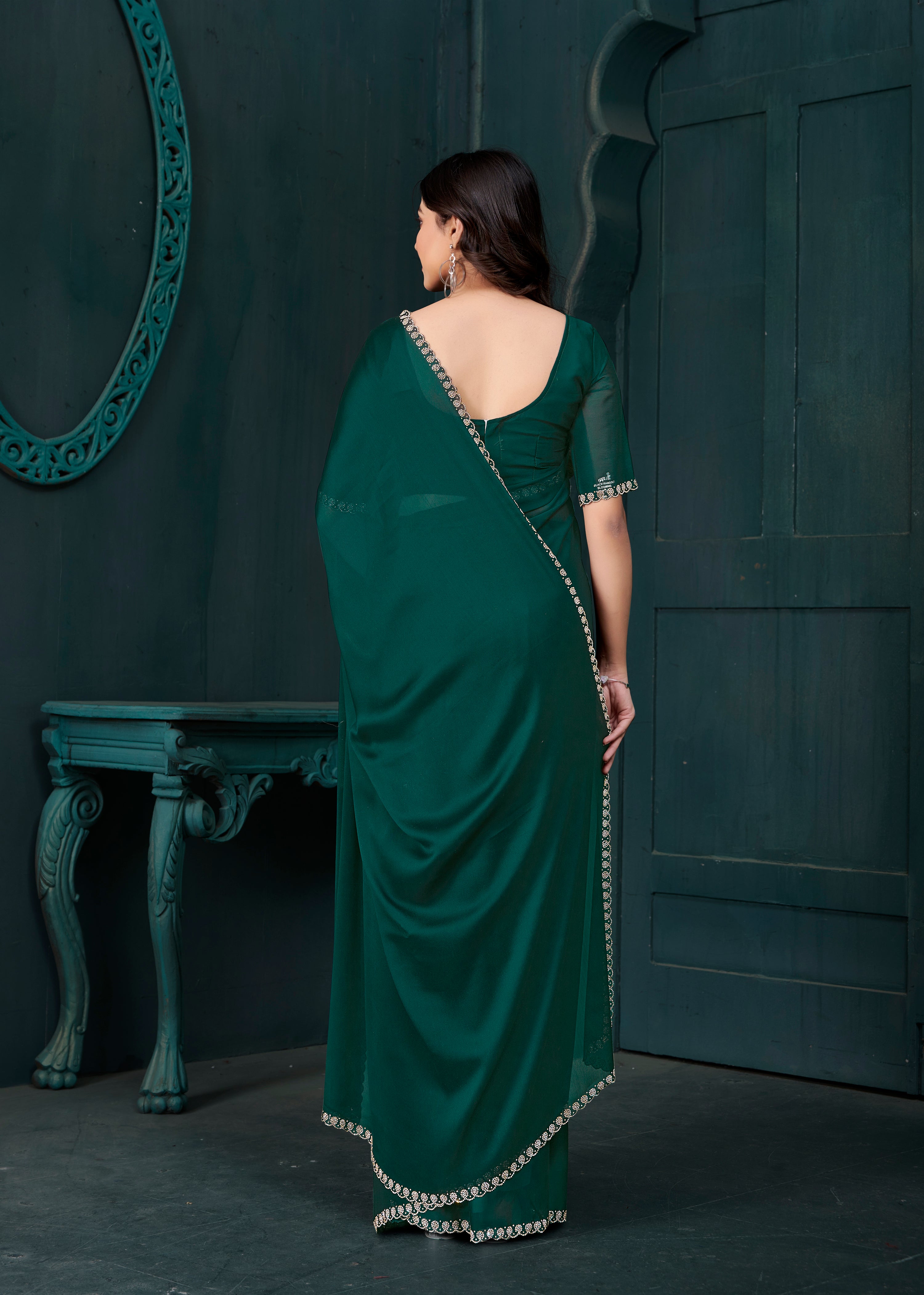 Deep Green Embellished Crepe Silk Saree