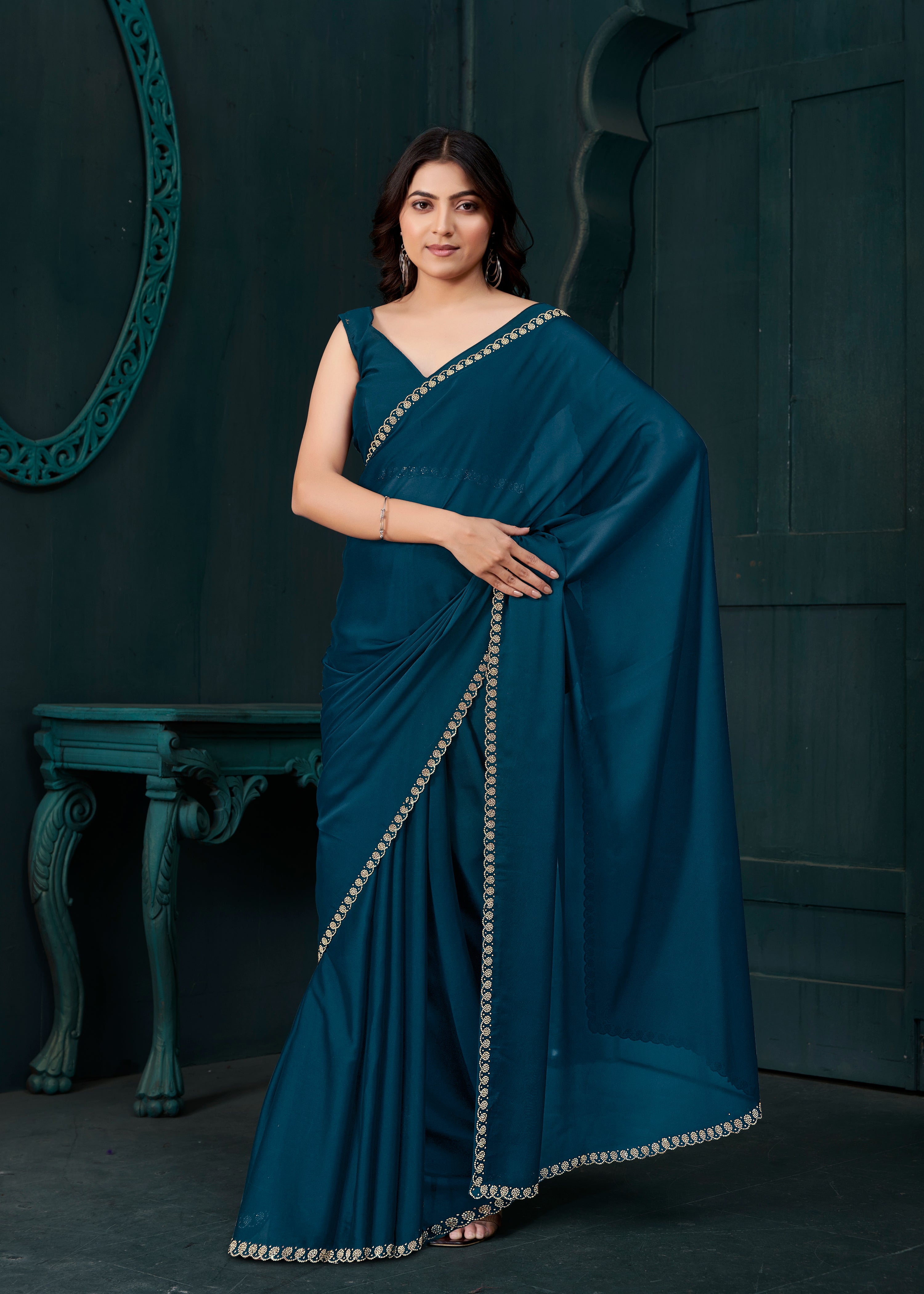 Deep Teal Embellished Crepe Silk Saree