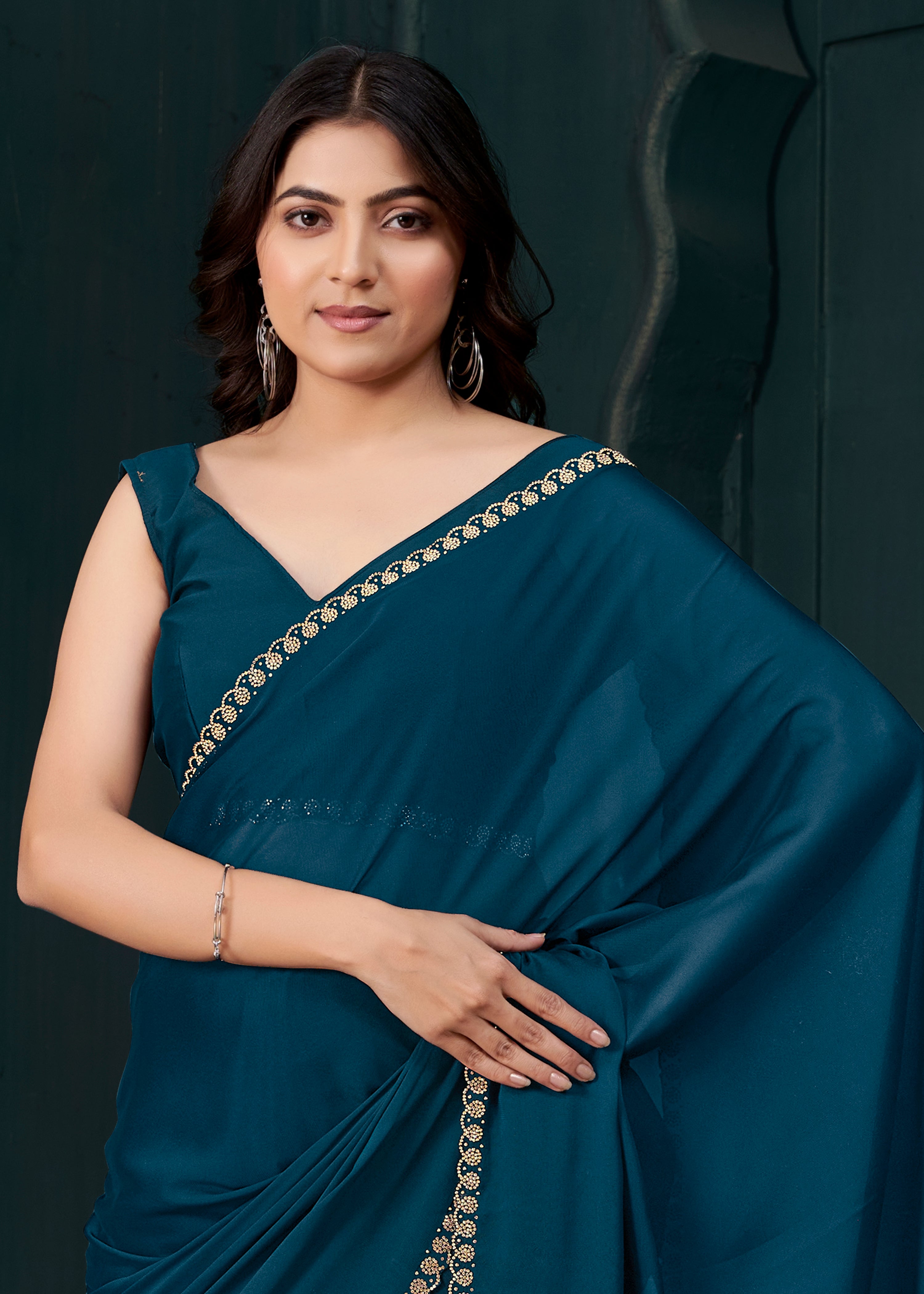 Deep Teal Embellished Crepe Silk Saree
