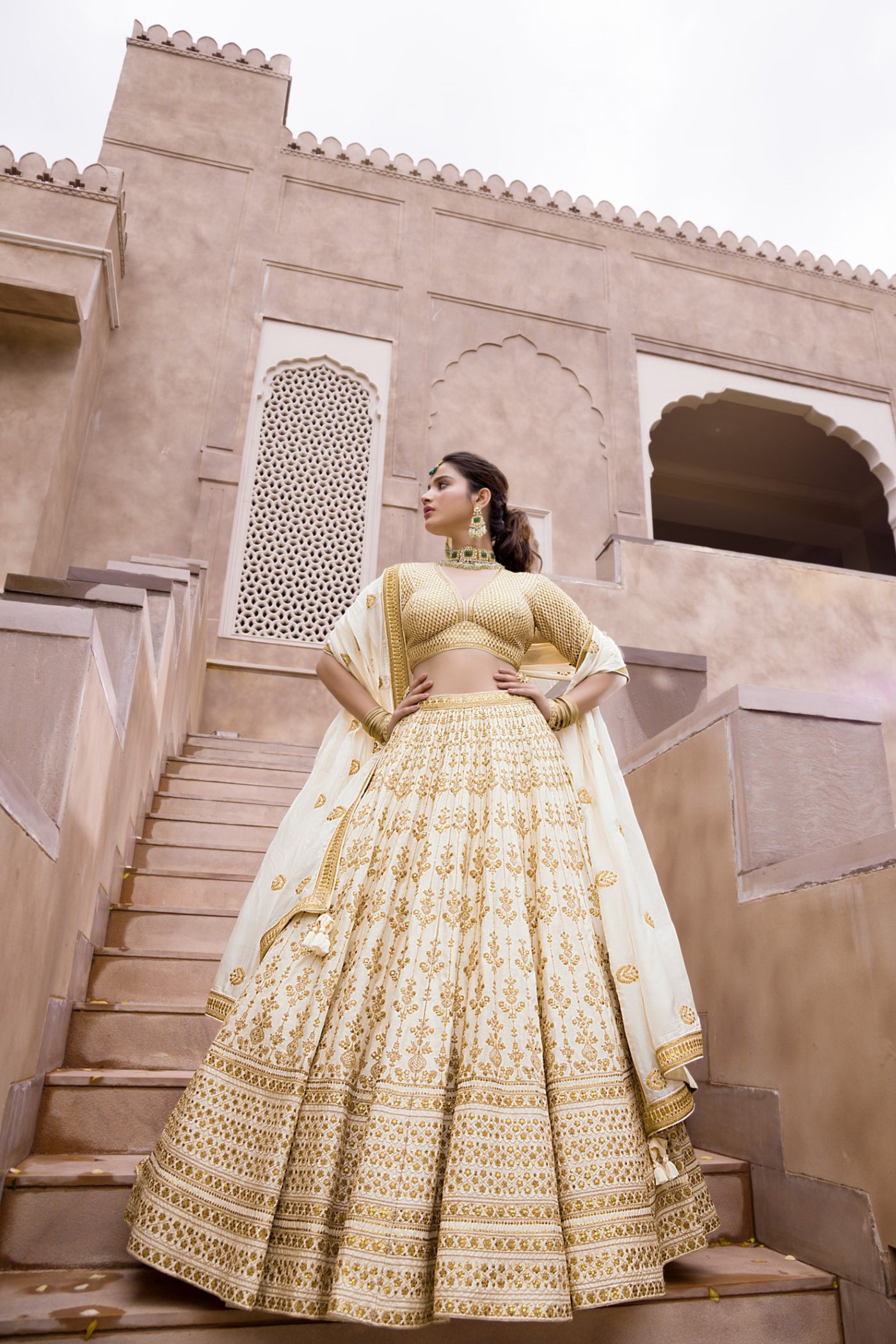 Off-White Fringed Tiered Lehenga main image 1