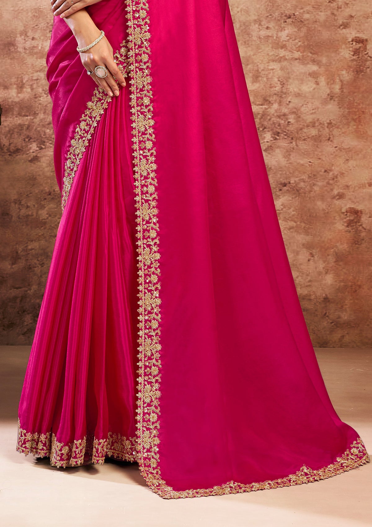 Vibrant Magenta Embellished Upadda Silk Saree