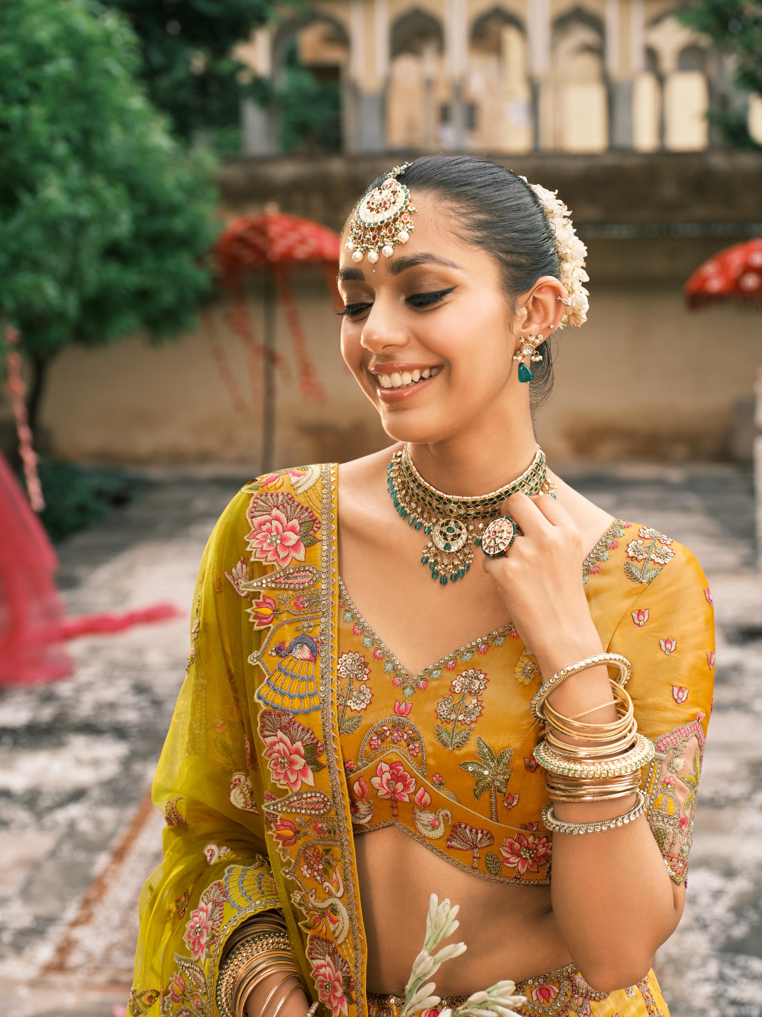 Yellow Multicolour Handwork Shimmer Tissue Silk Embellished Lehenga Set