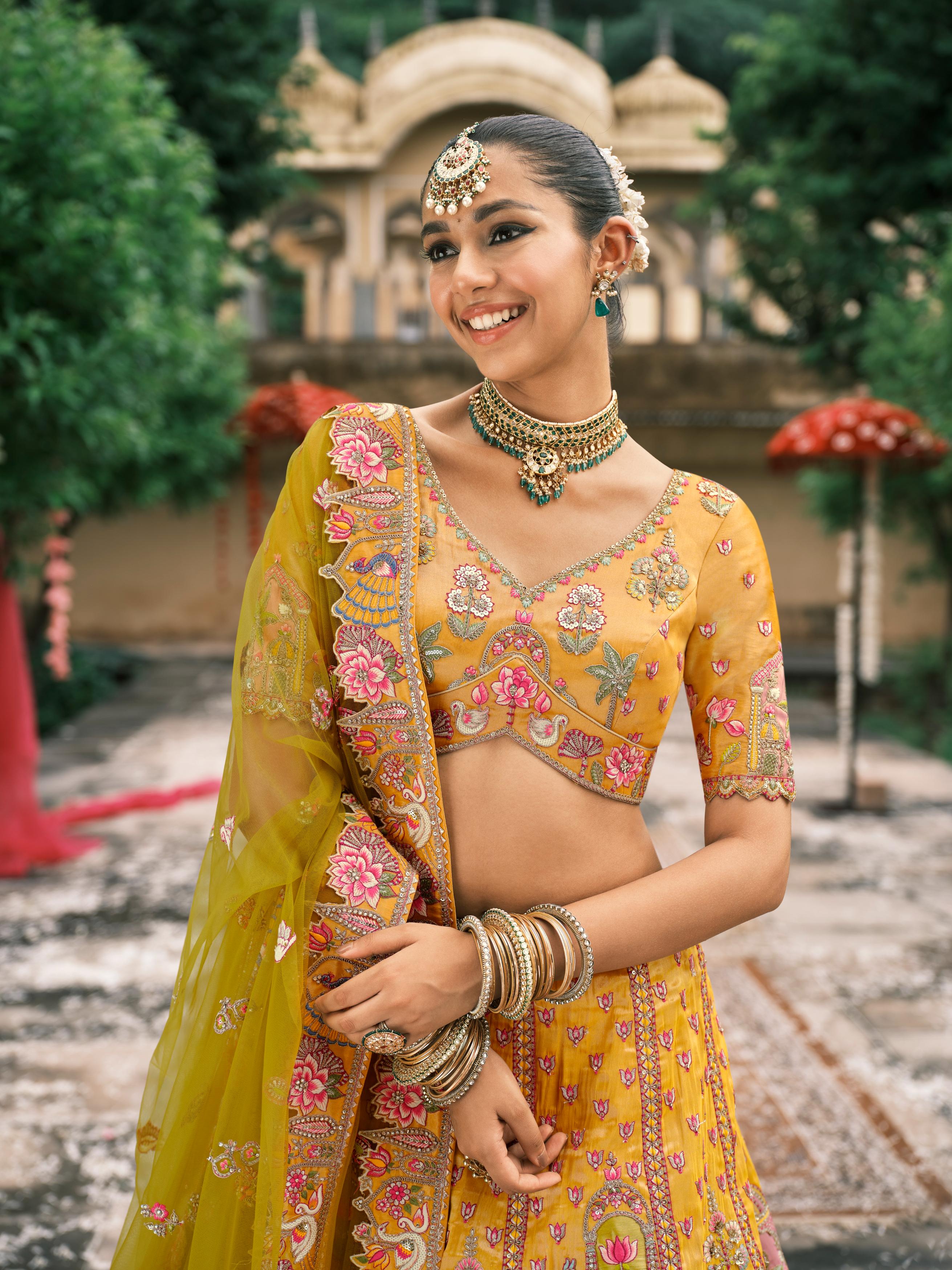 Yellow Multicolour Handwork Shimmer Tissue Silk Embellished Lehenga Set