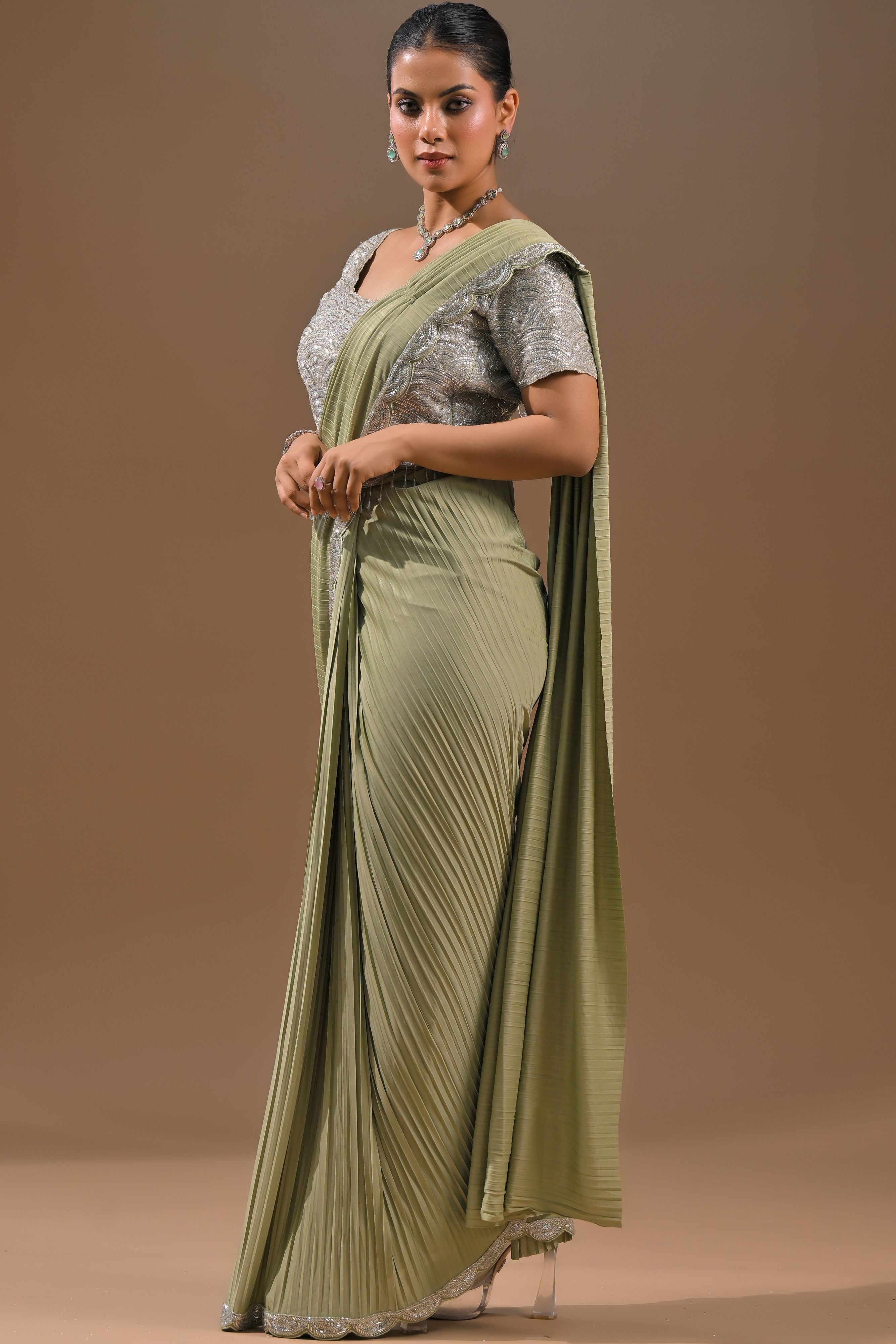 Pastel Green Embellished Pleated Saree