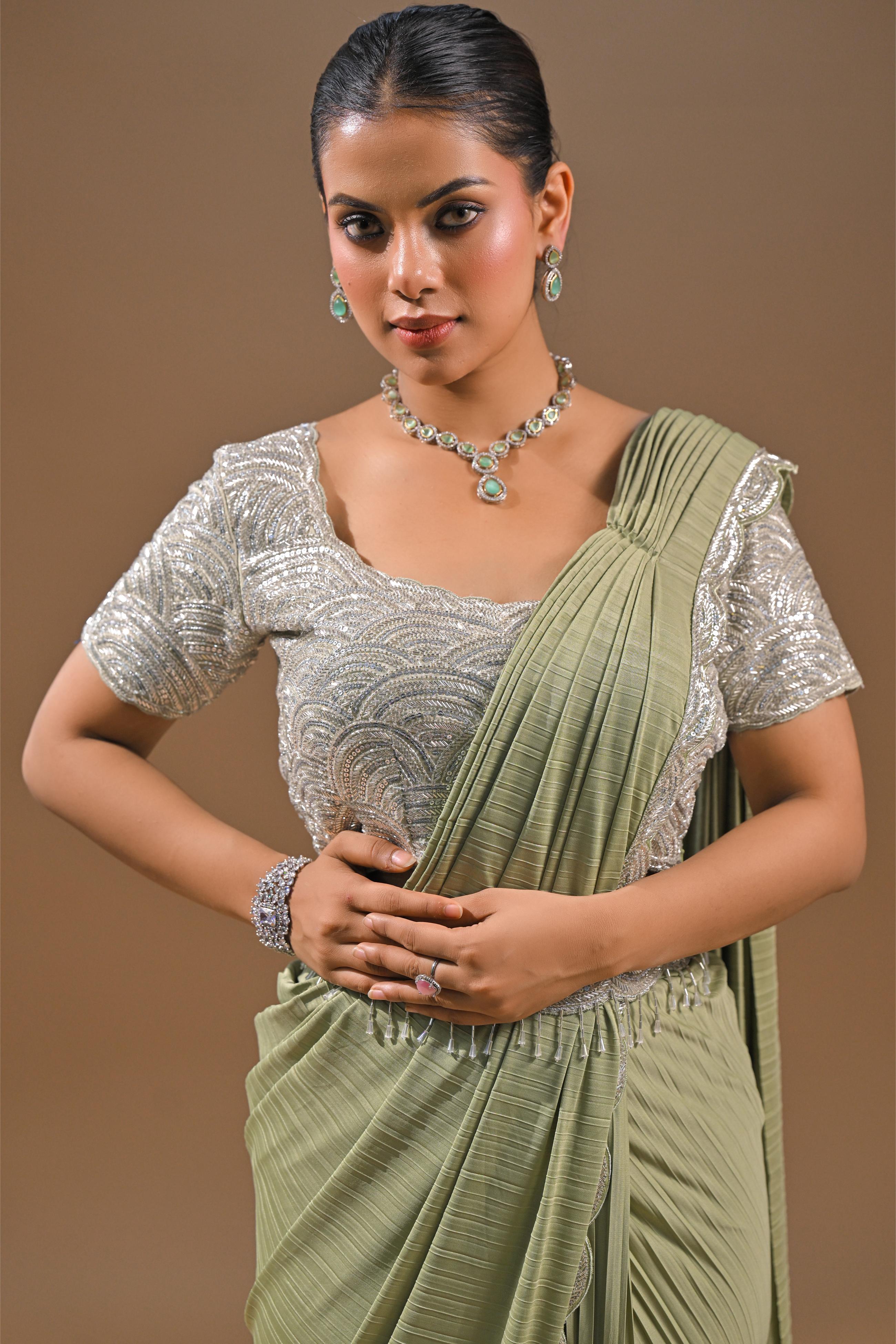 Pastel Green Embellished Pleated Saree