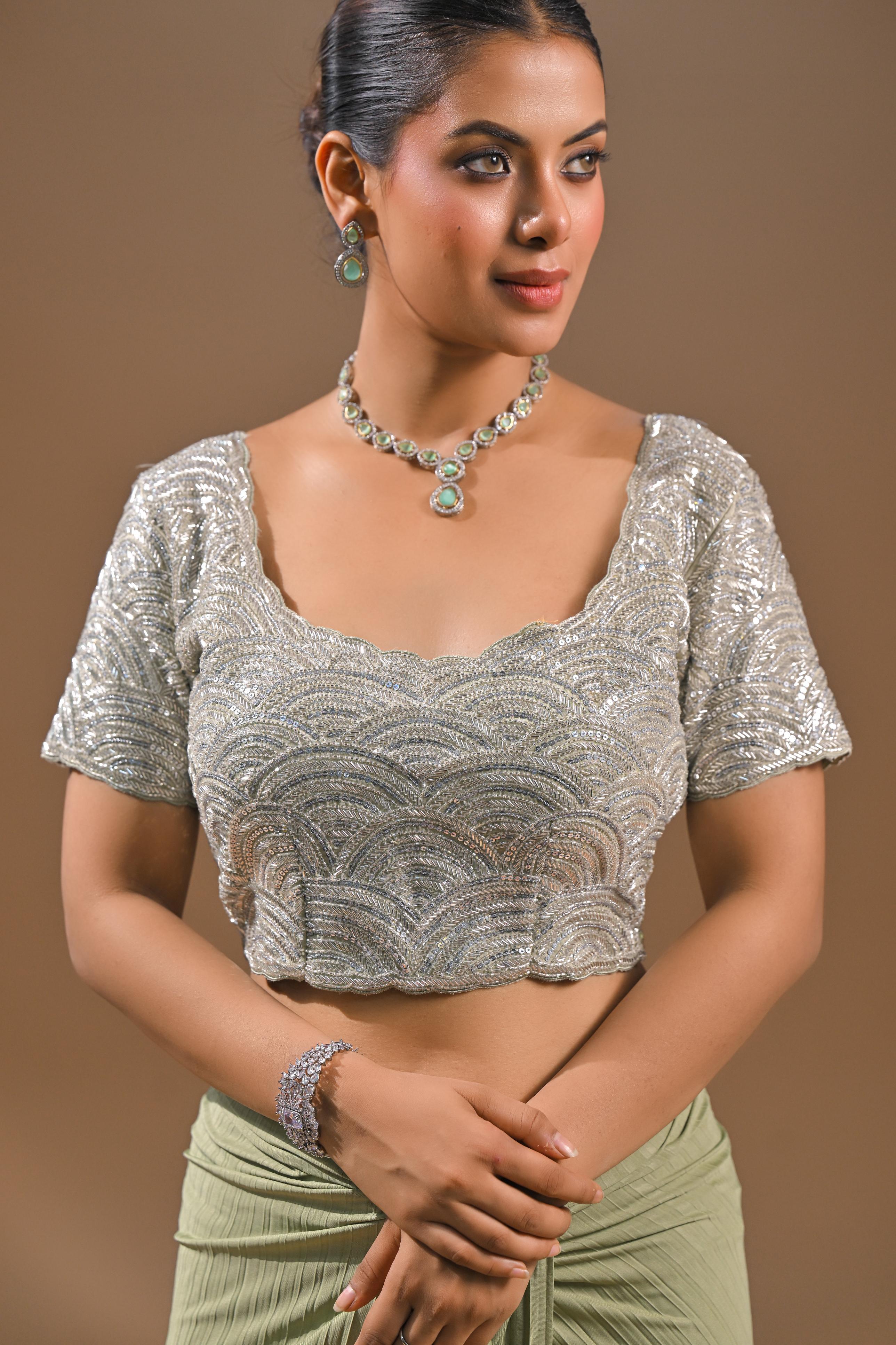 Pastel Green Embellished Pleated Saree