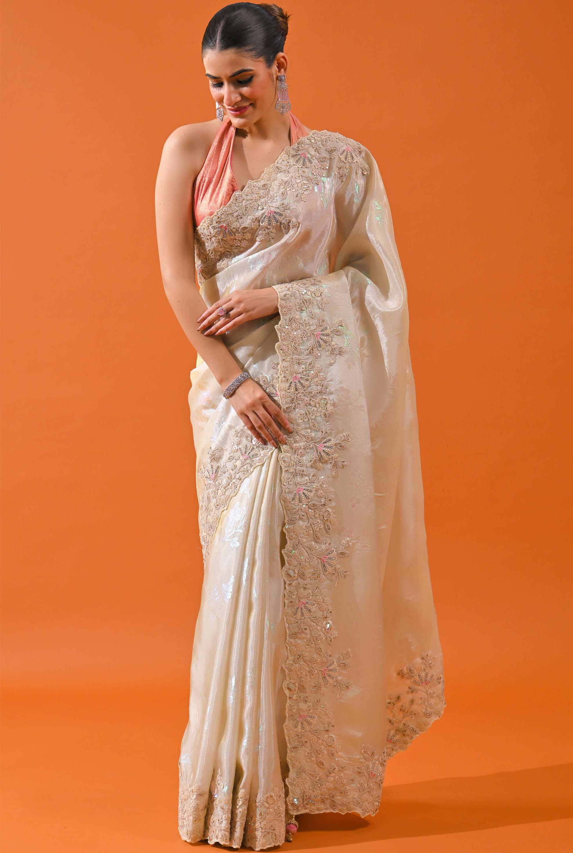 Ivory Embroidered Cosmo Tissue Silk Saree