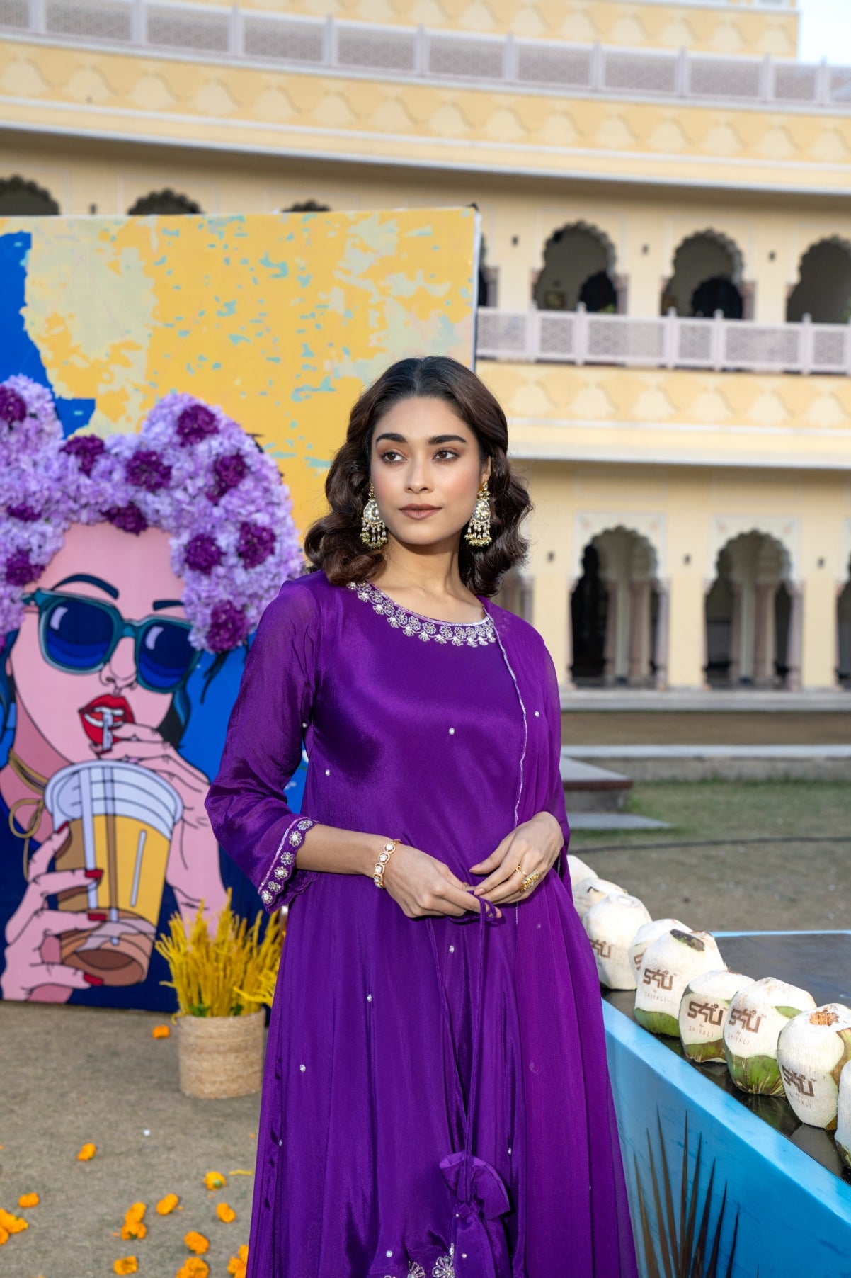 Purple Embellished Asymmetrical Kurta Set with Potli bag