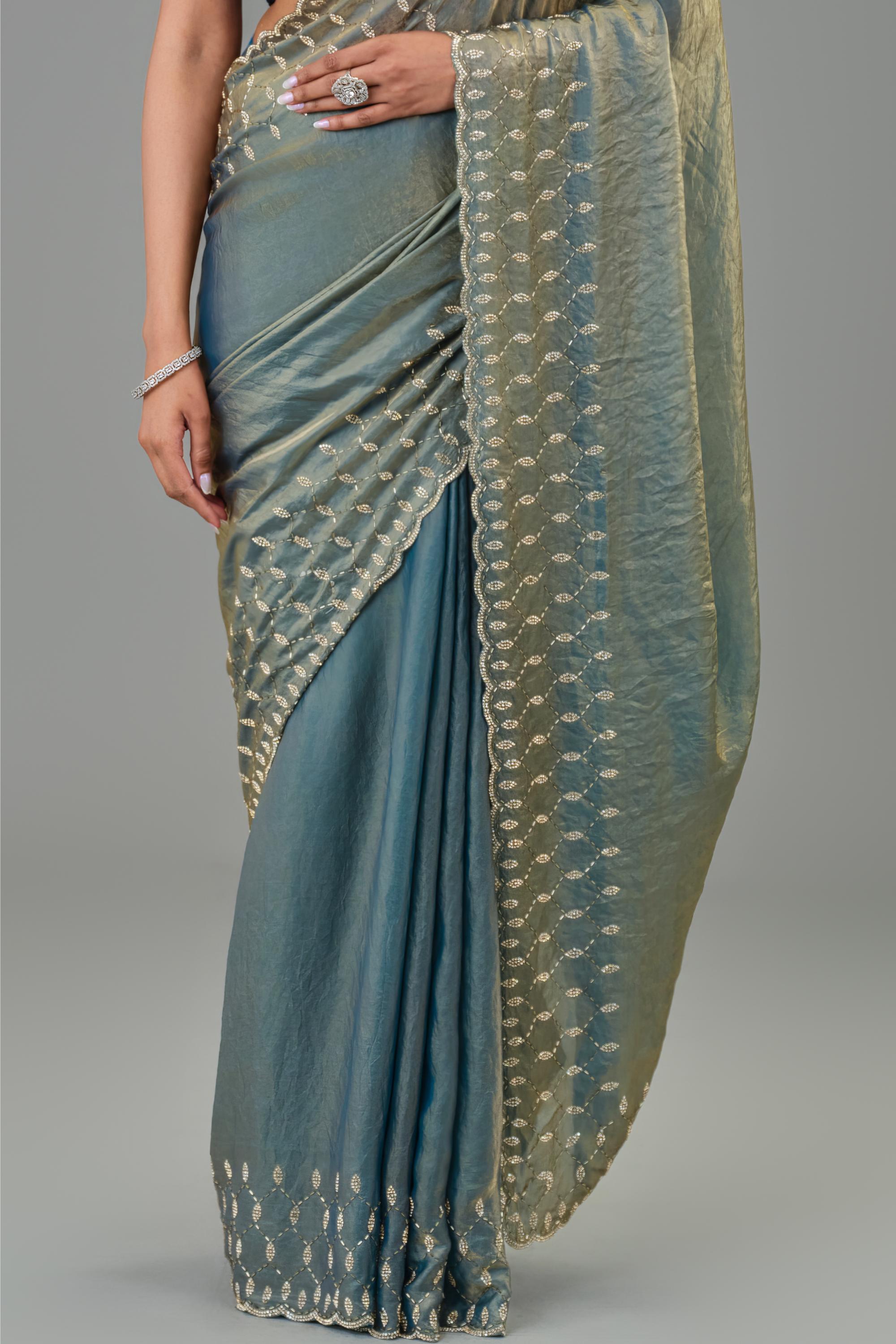 Teal Embellished Tissue Silk Saree