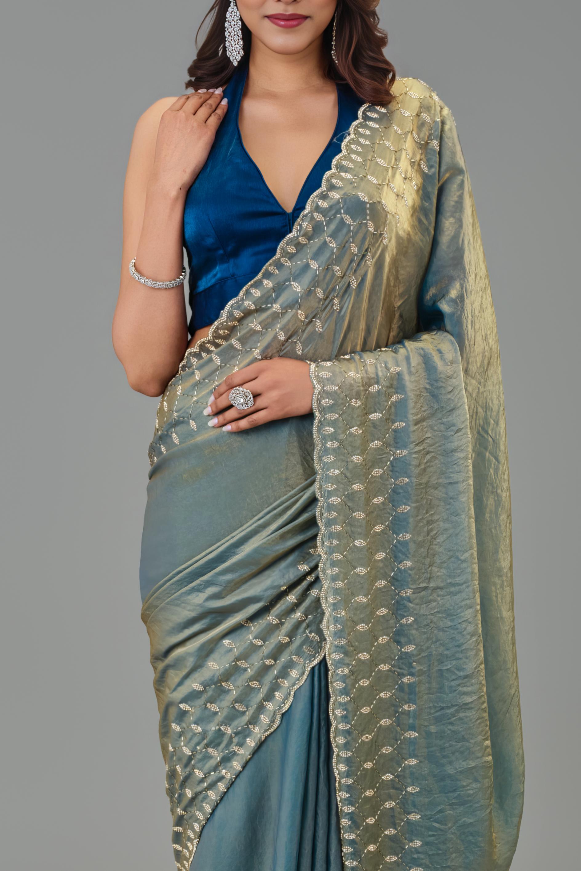 Teal Embellished Tissue Silk Saree