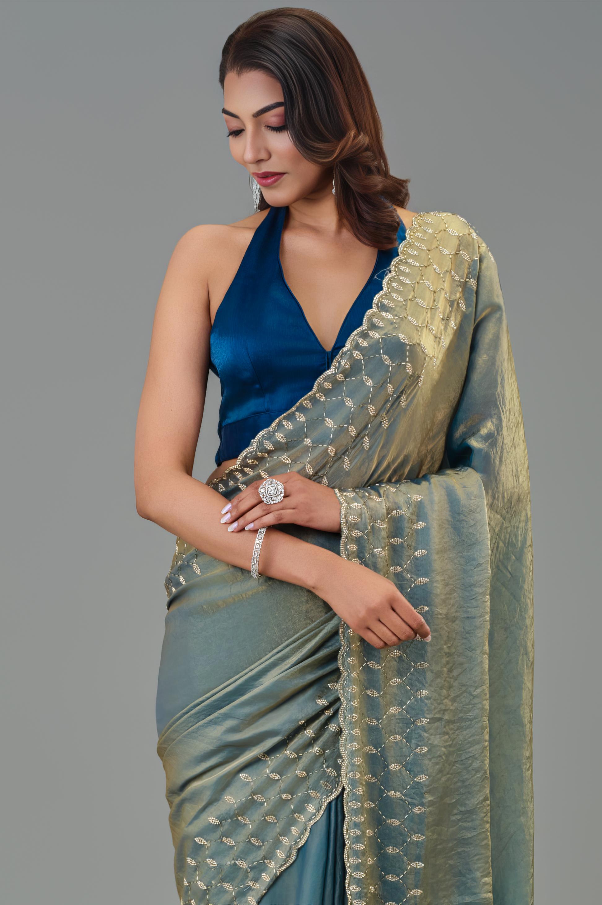 Teal Embellished Tissue Silk Saree
