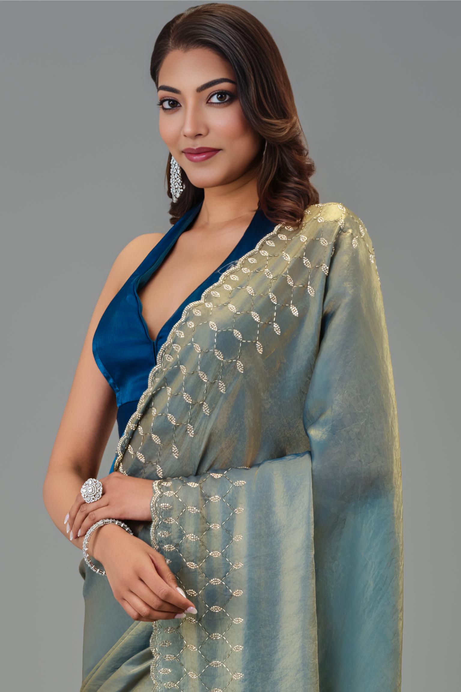Teal Embellished Tissue Silk Saree