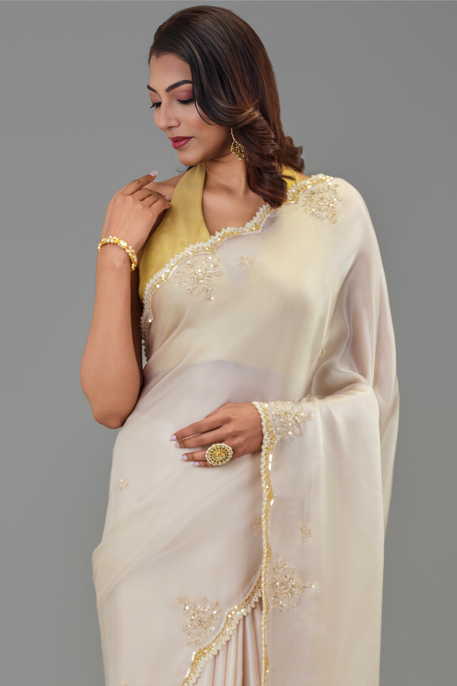 Ivory Embroidered Cosmo Silk Saree