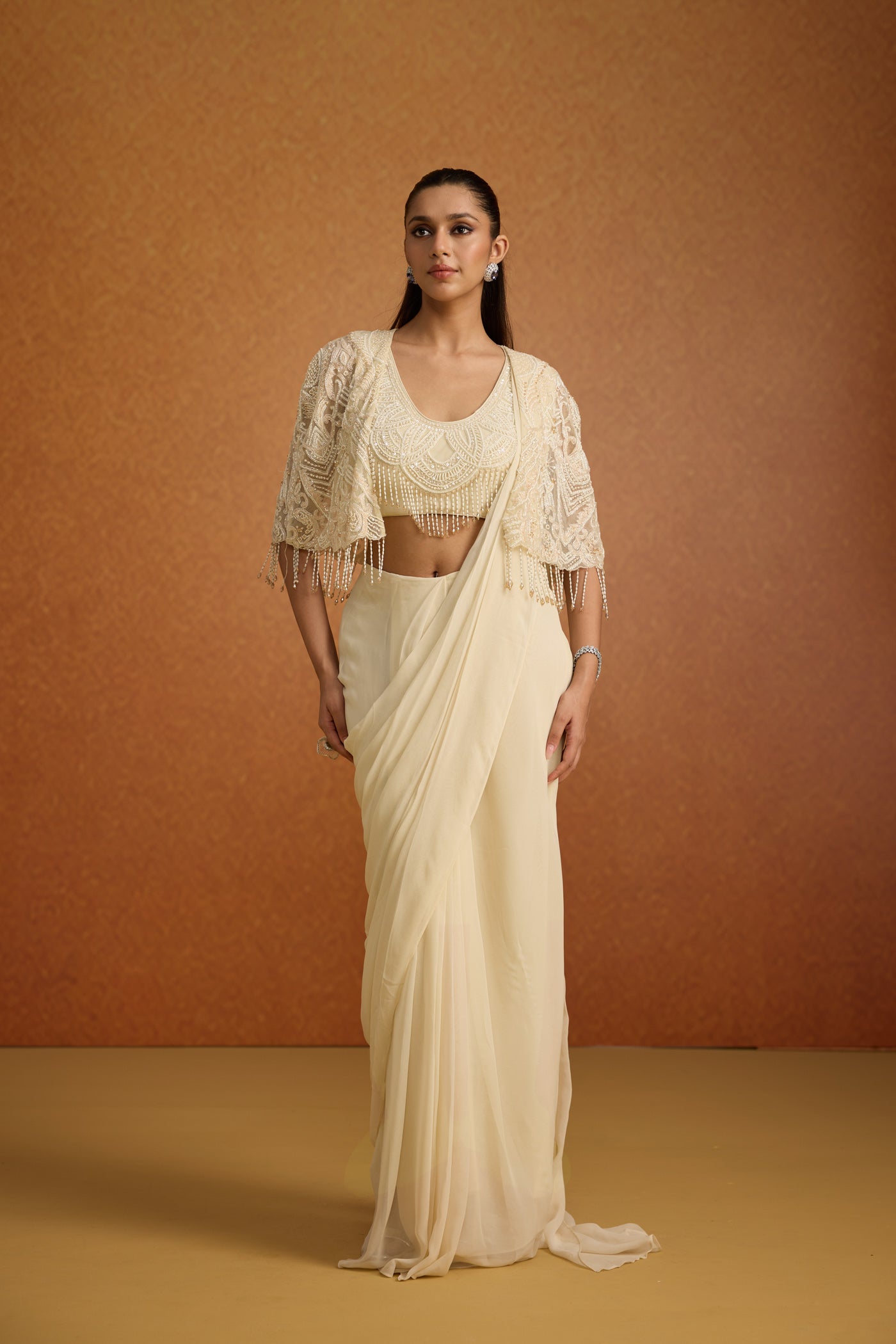 Ivory Embellished Soft Georgette Pre-Draped Saree