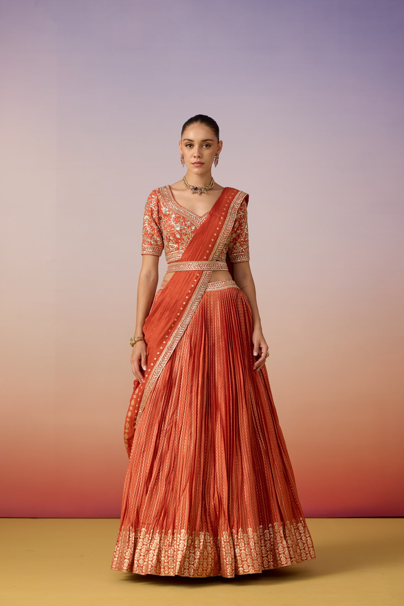 Rust Orange Embellished Crushed Silk Lehenga Set