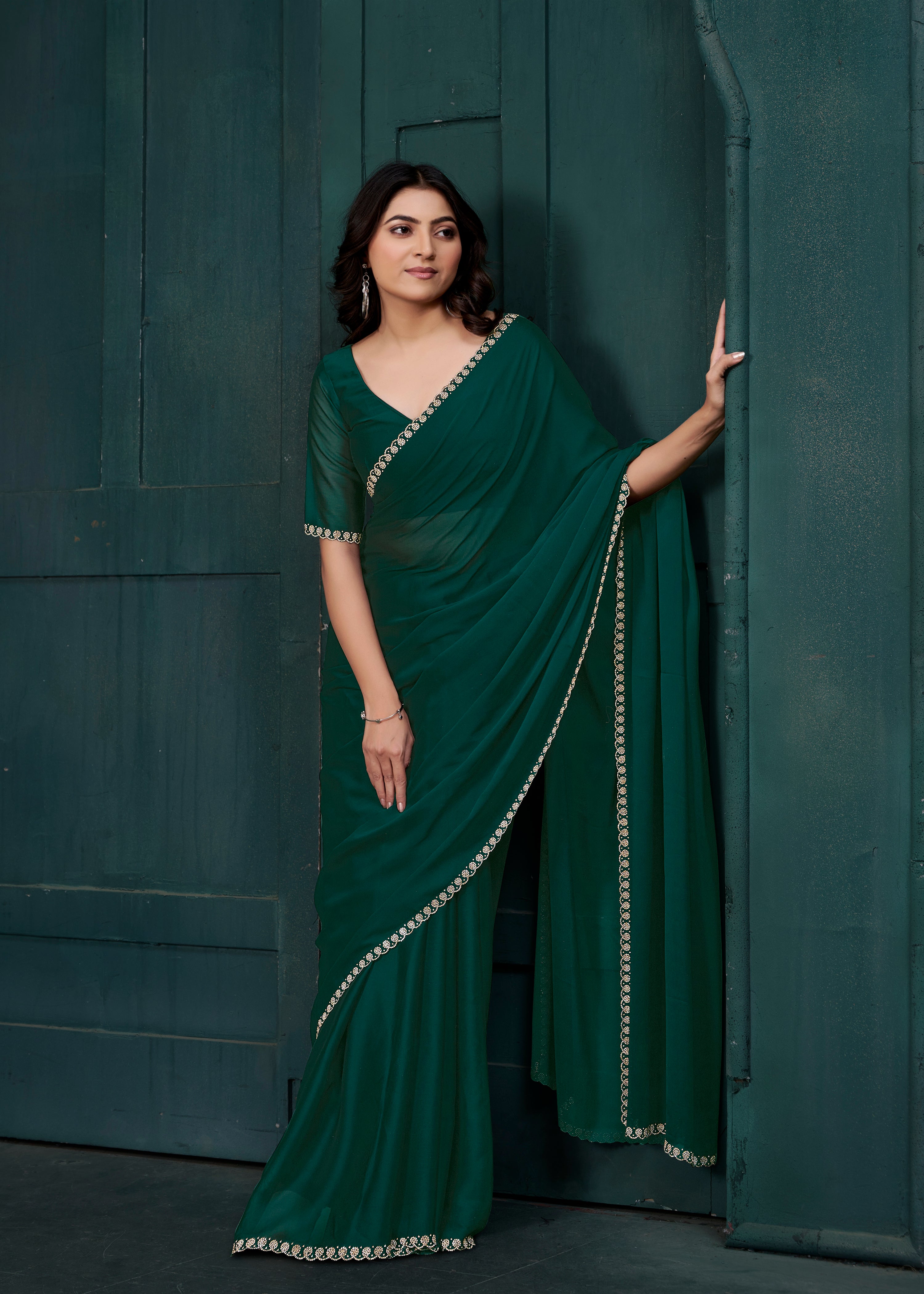 Deep Green Embellished Crepe Silk Saree
