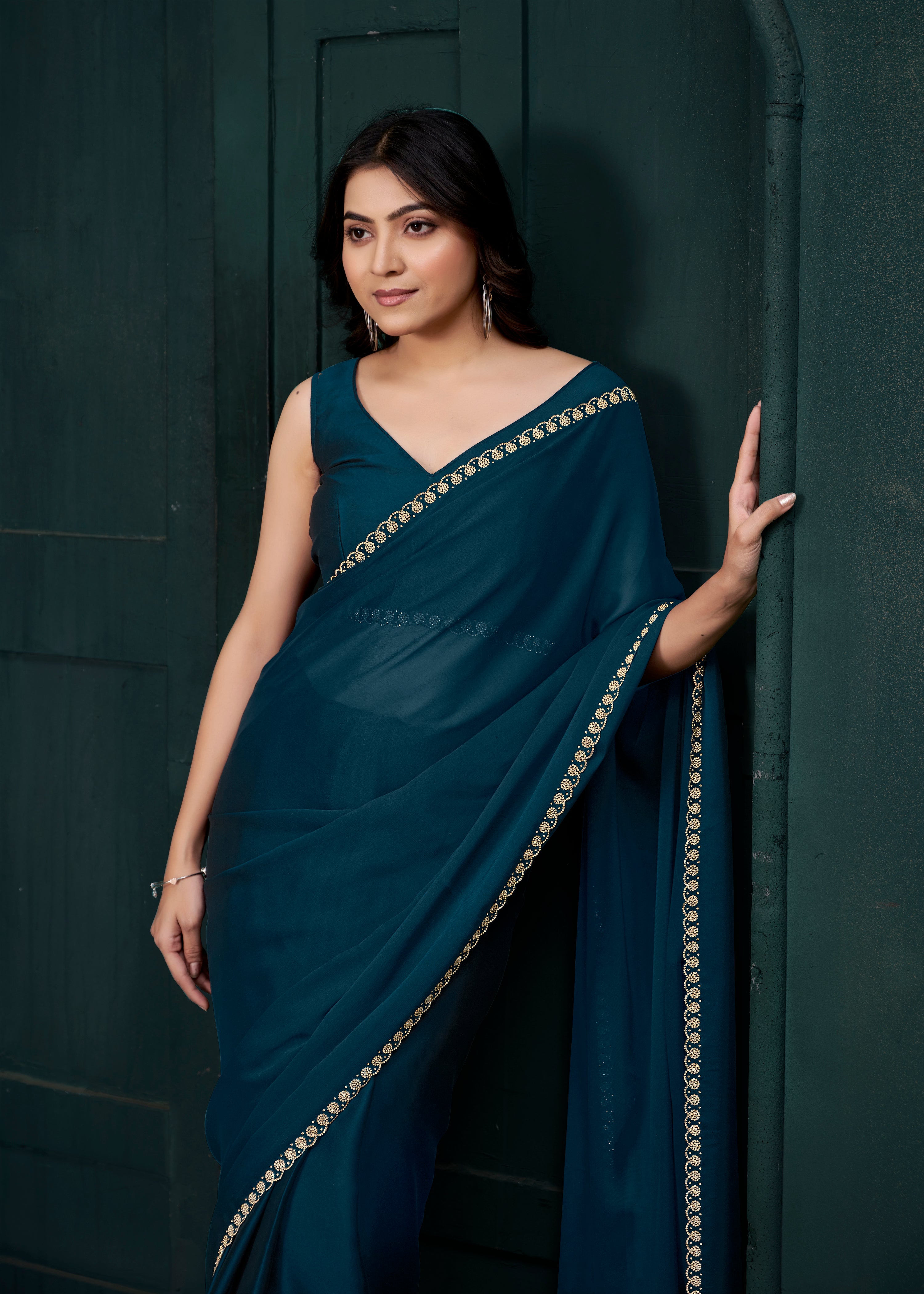 Deep Teal Embellished Crepe Silk Saree