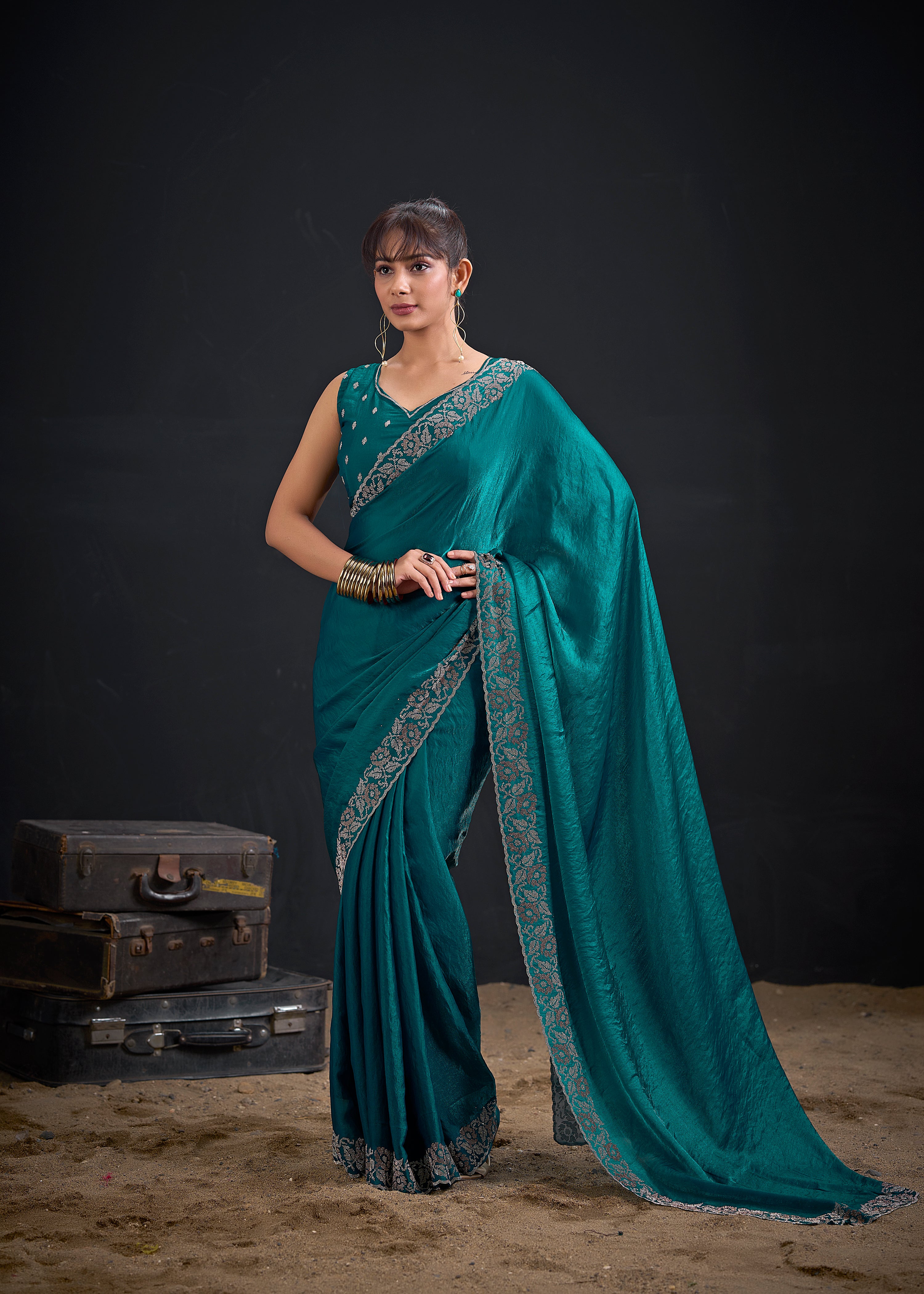 Opulent Blue Embellished Satin Silk Saree