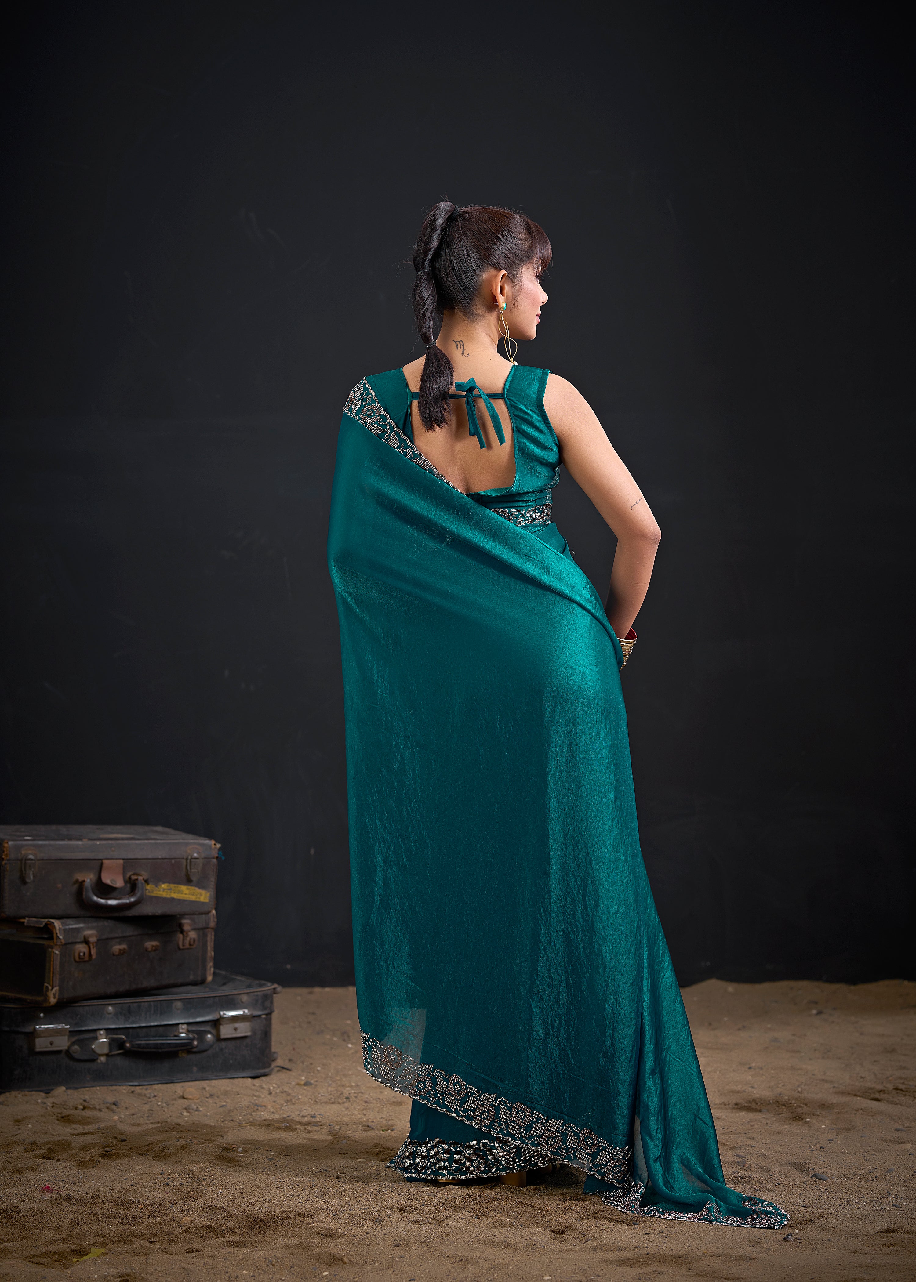 Opulent Blue Embellished Satin Silk Saree