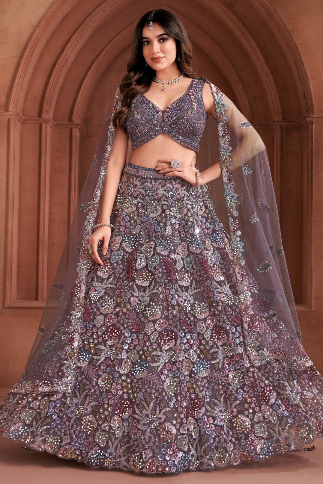 Exuberant Wine Embellished Premium Silk Lehenga Set