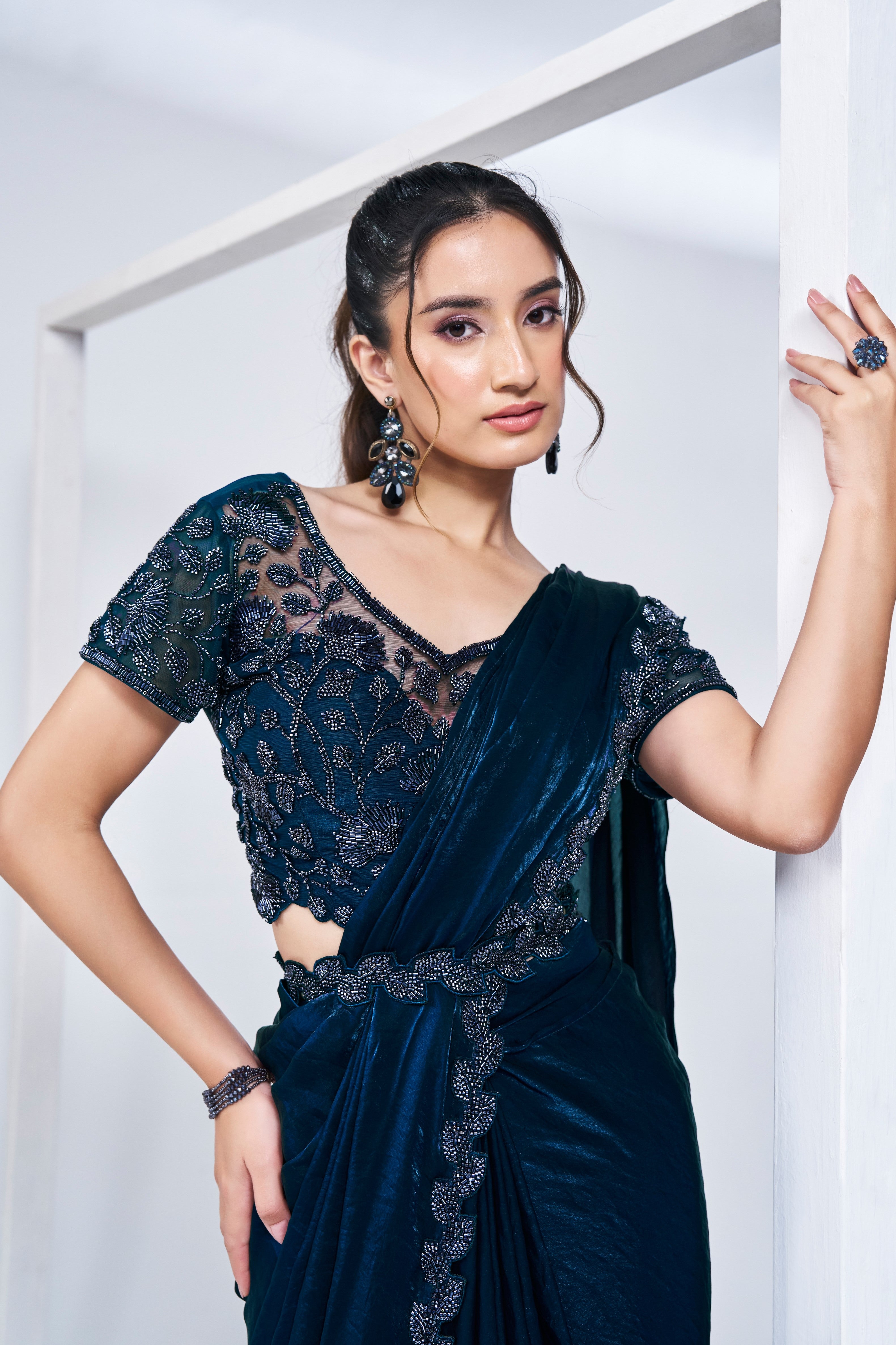 Teal Embellished Satin Silk Saree