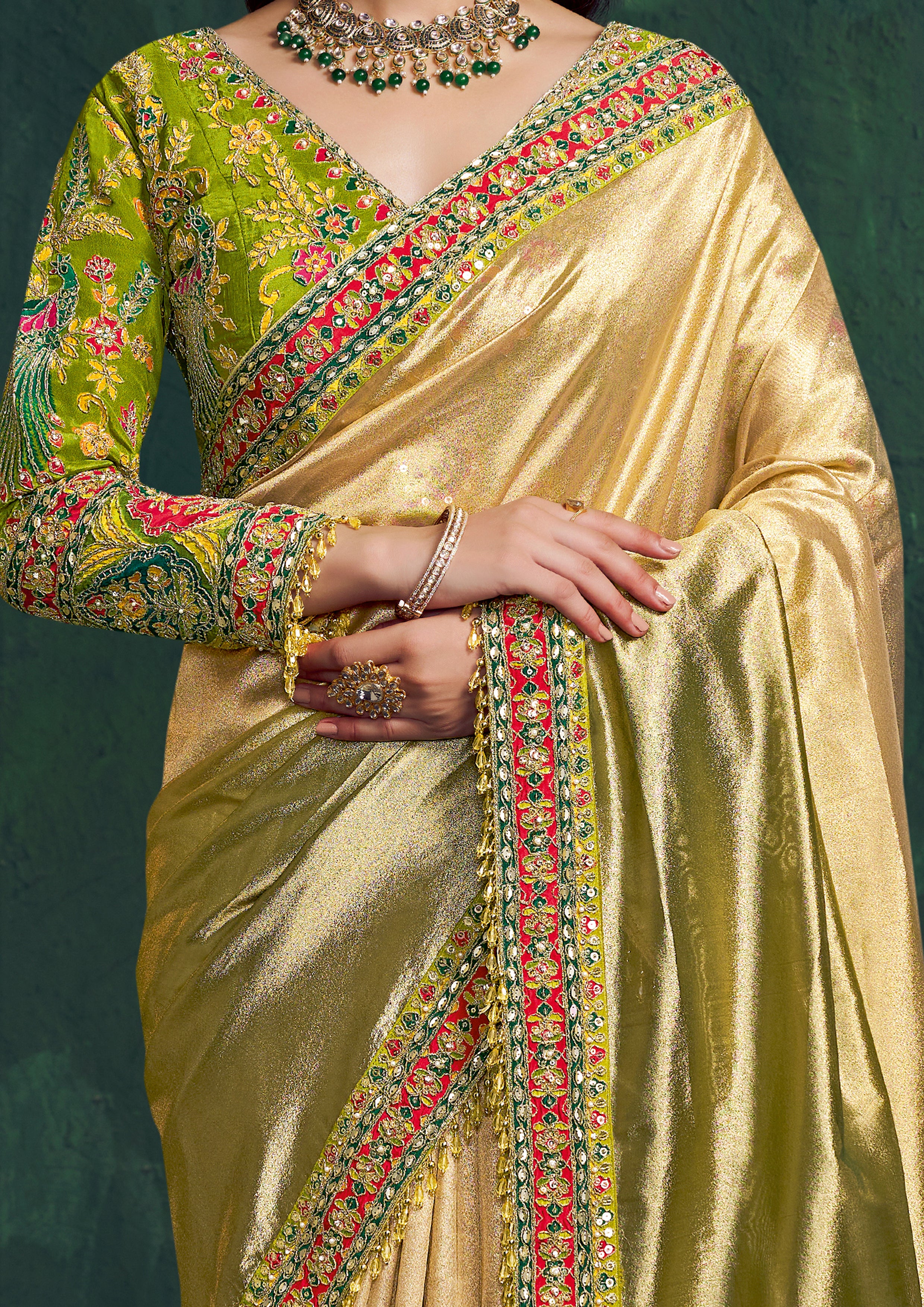 Sunglow Green Embroidered Shimmer Tissue Silk Saree