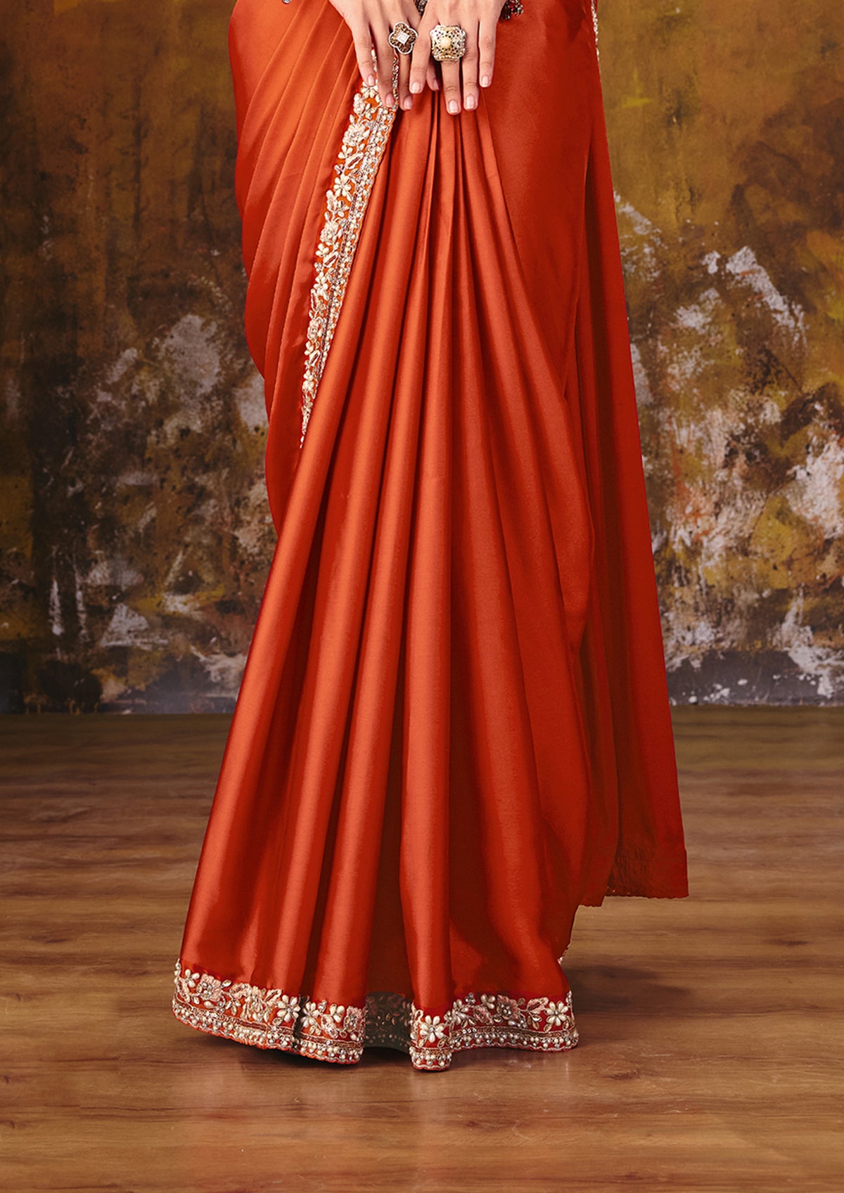Fiery Orange Embellished Satin Silk Saree