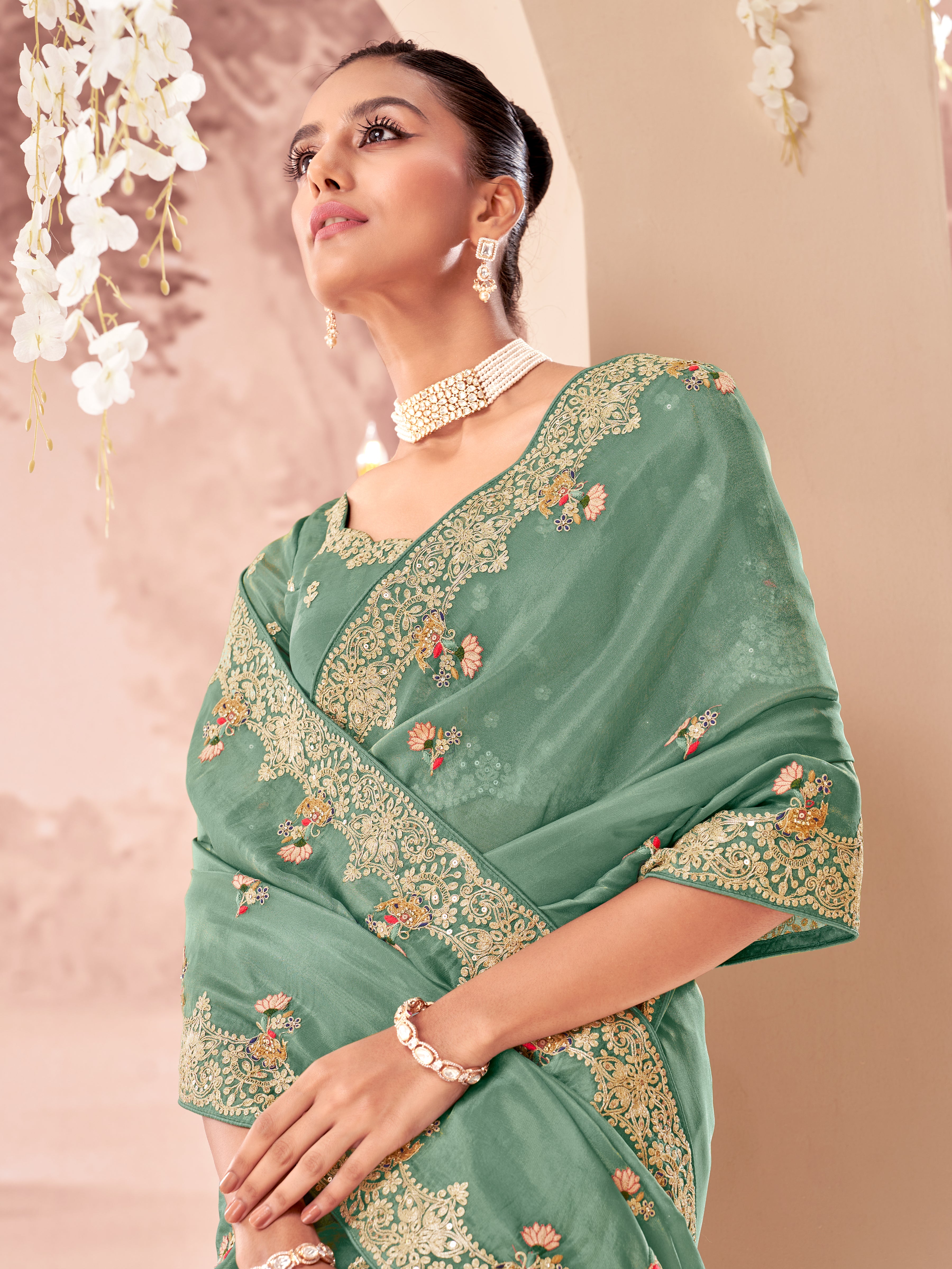 Teal Green Embellished Tissue Silk Saree