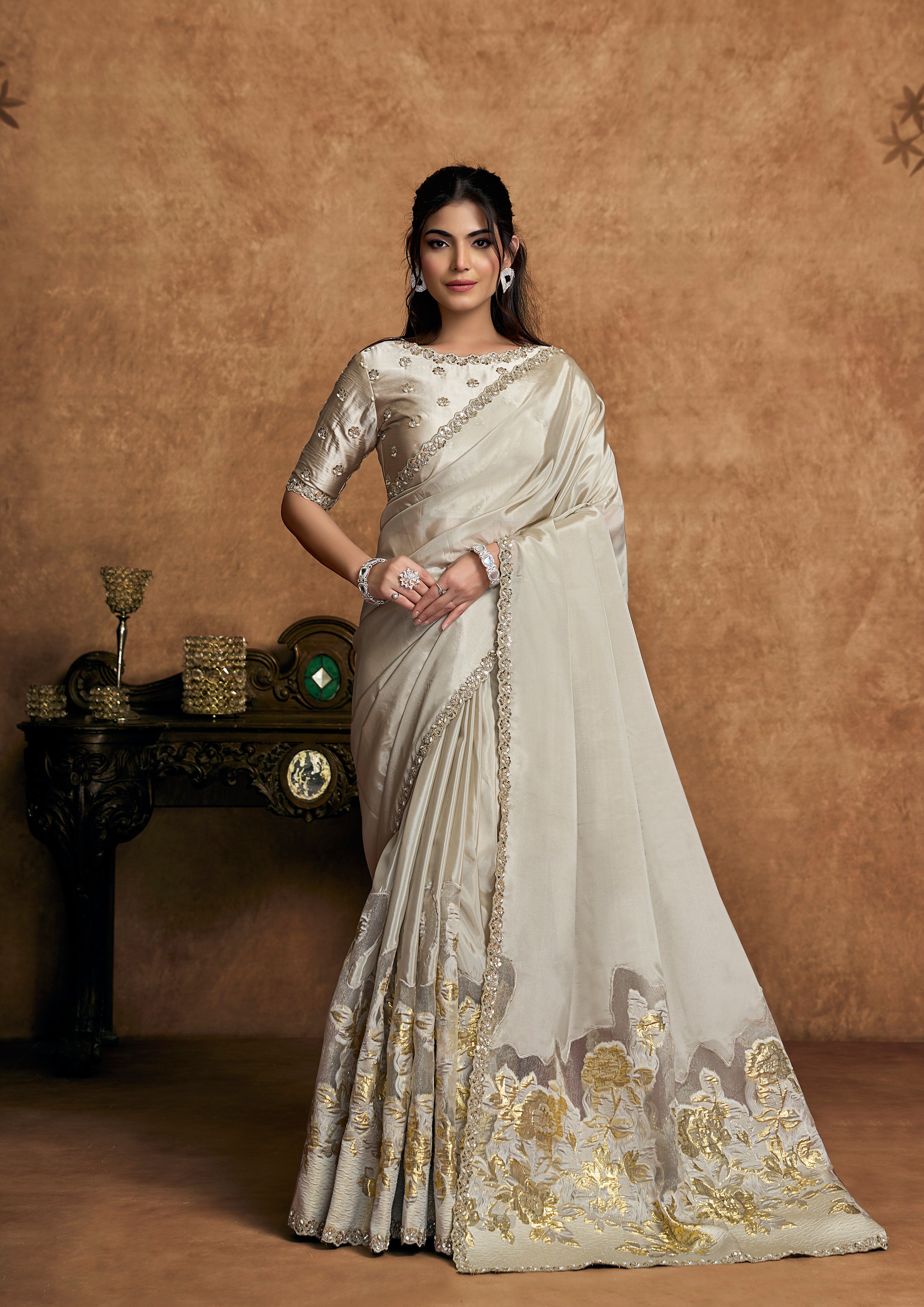 Champagne Ivory Embellished Crepe Silk Saree