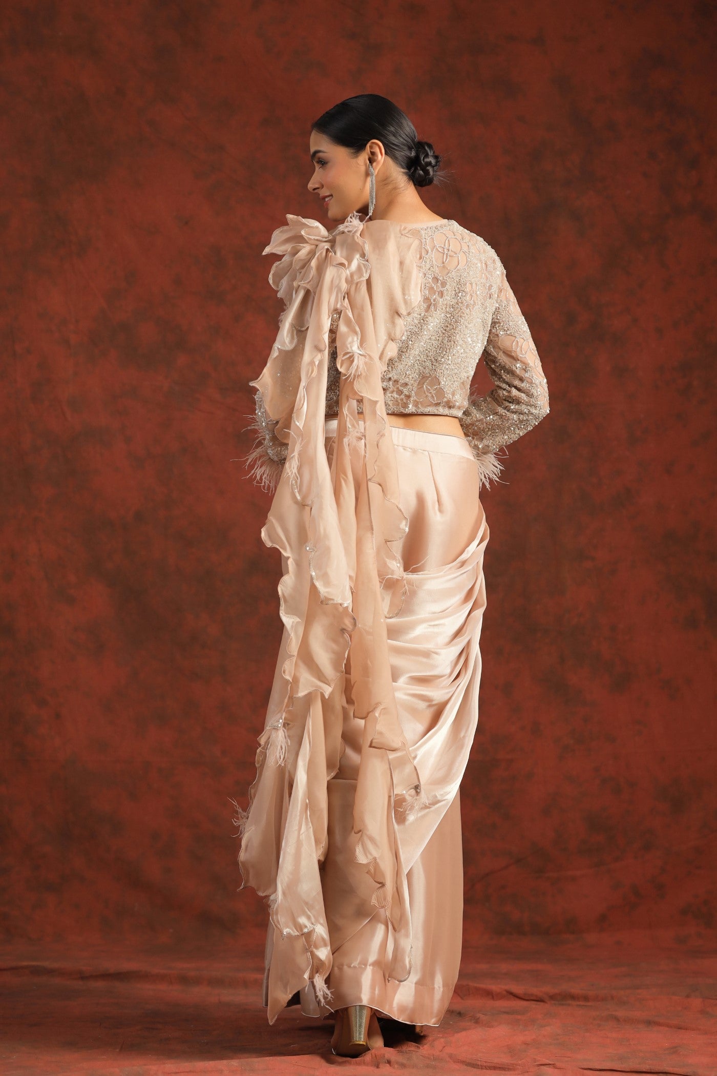 Pastel Peach Sequin Embellished Draped Saree
