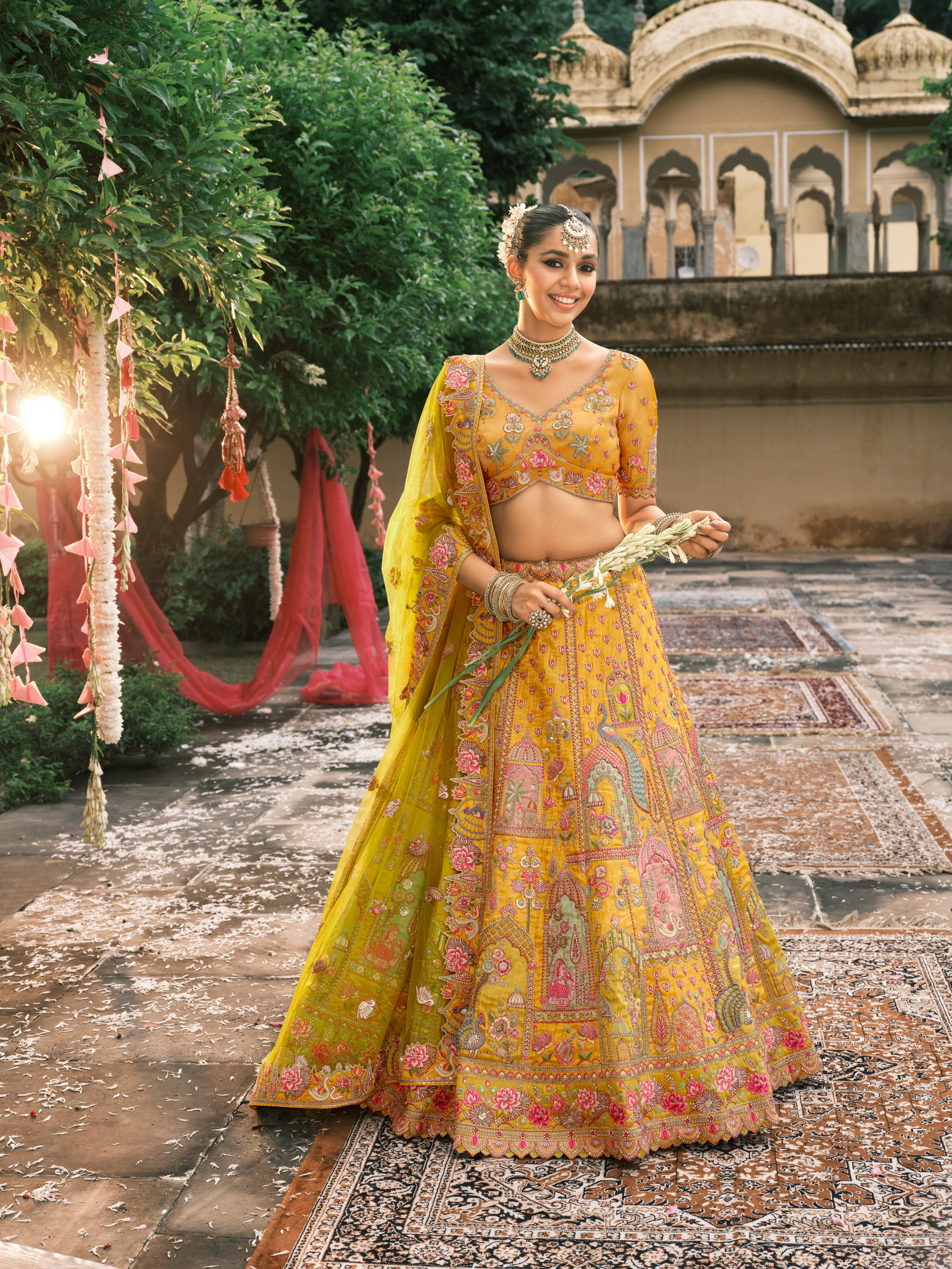 Yellow Multicolour Handwork Shimmer Tissue Silk Embellished Lehenga Set