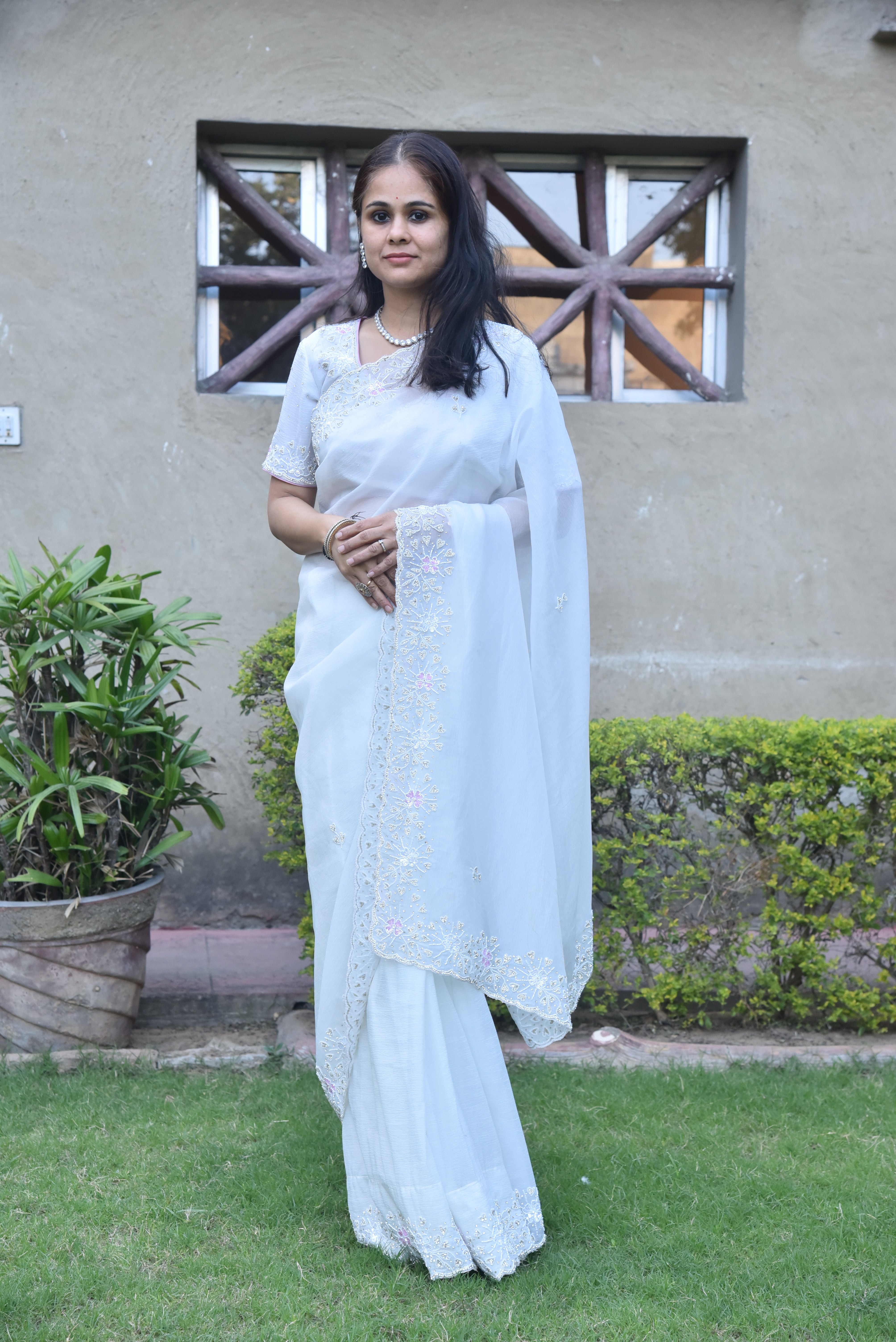 Regal White Embellished Chiffon Silk Saree