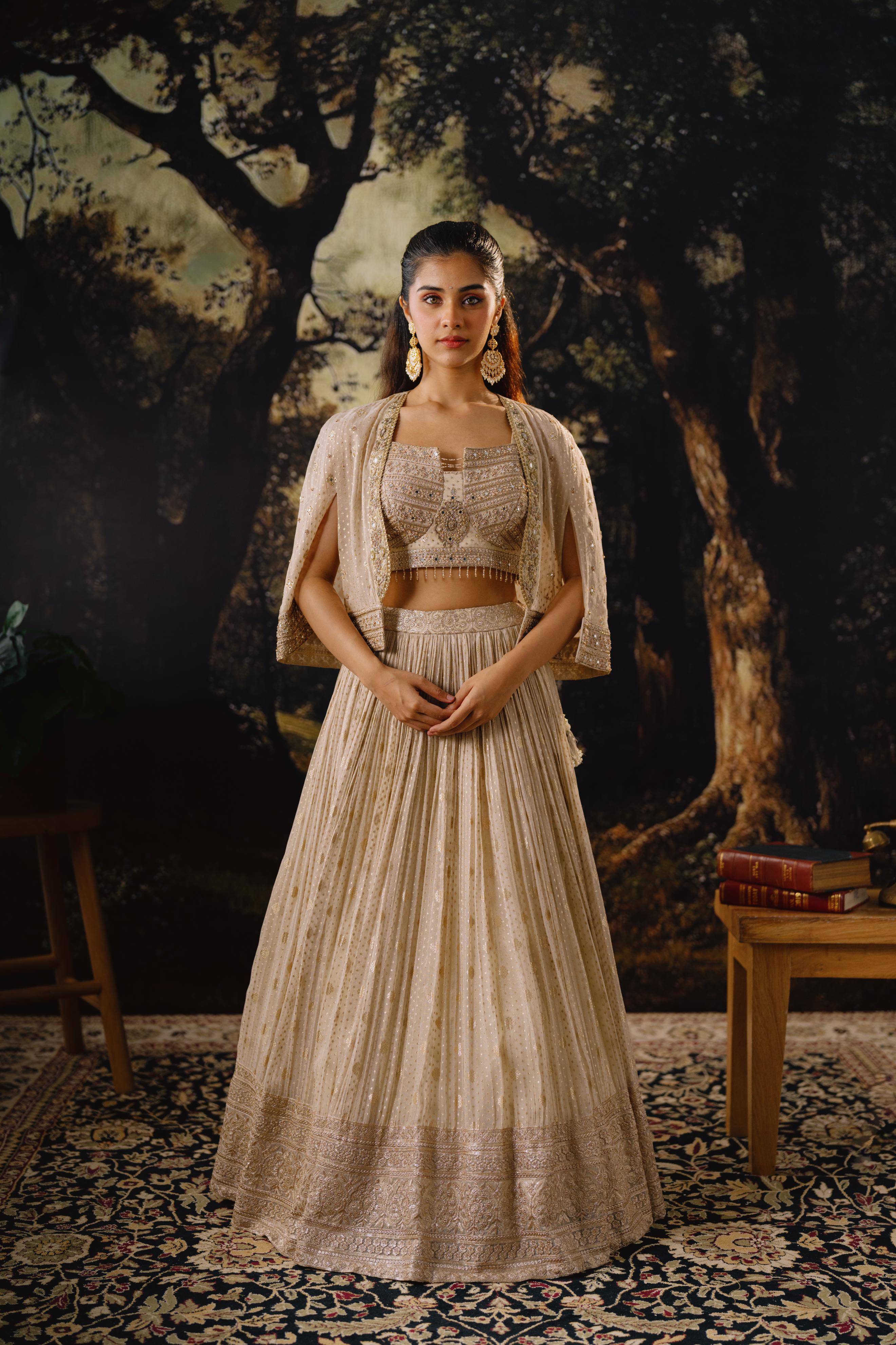 Champagne Embellished Lehenga Set with Short Cape