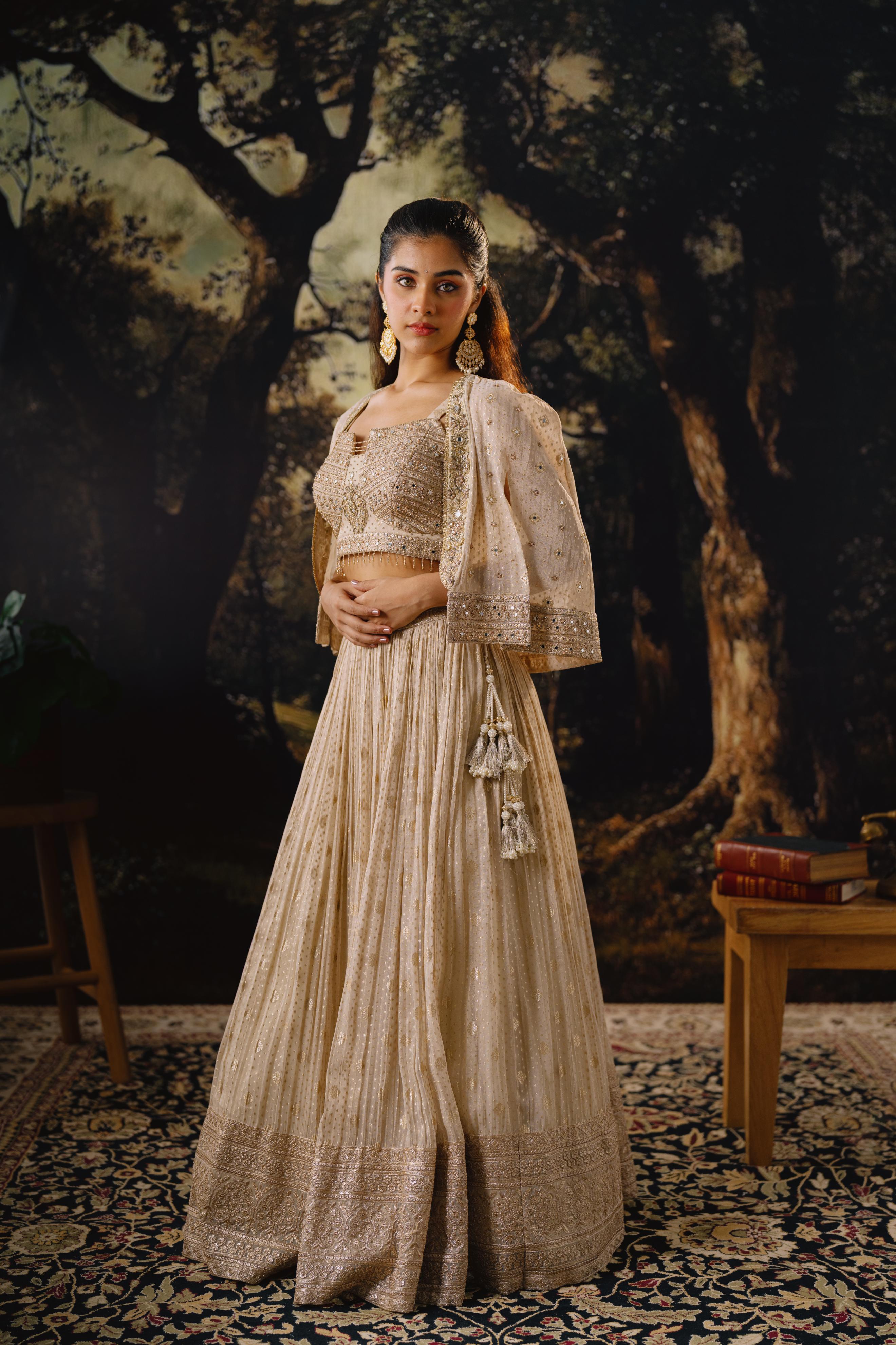 Champagne Embellished Lehenga Set with Short Cape