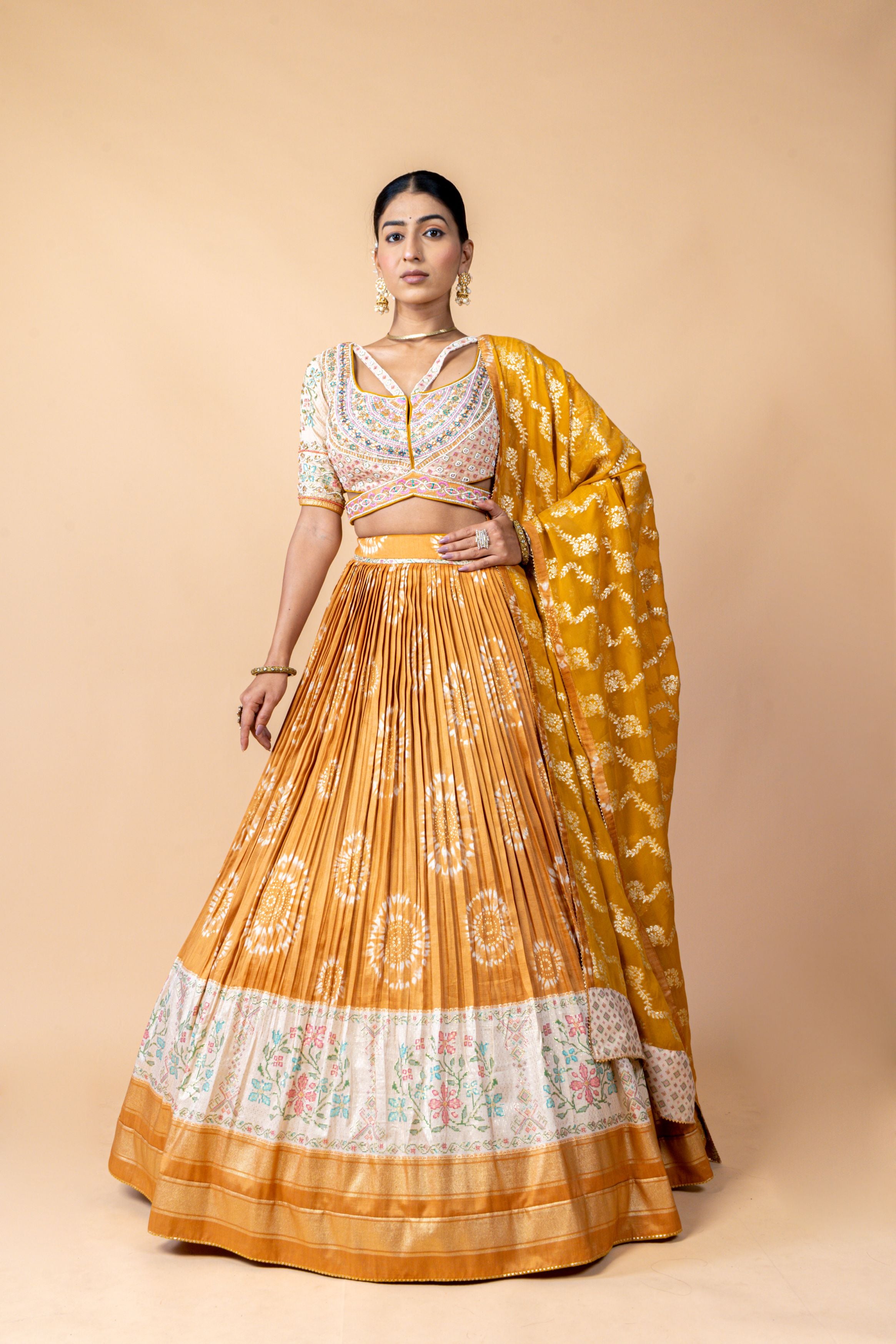 Mustard Embellished Brocade Silk Lehenga Set