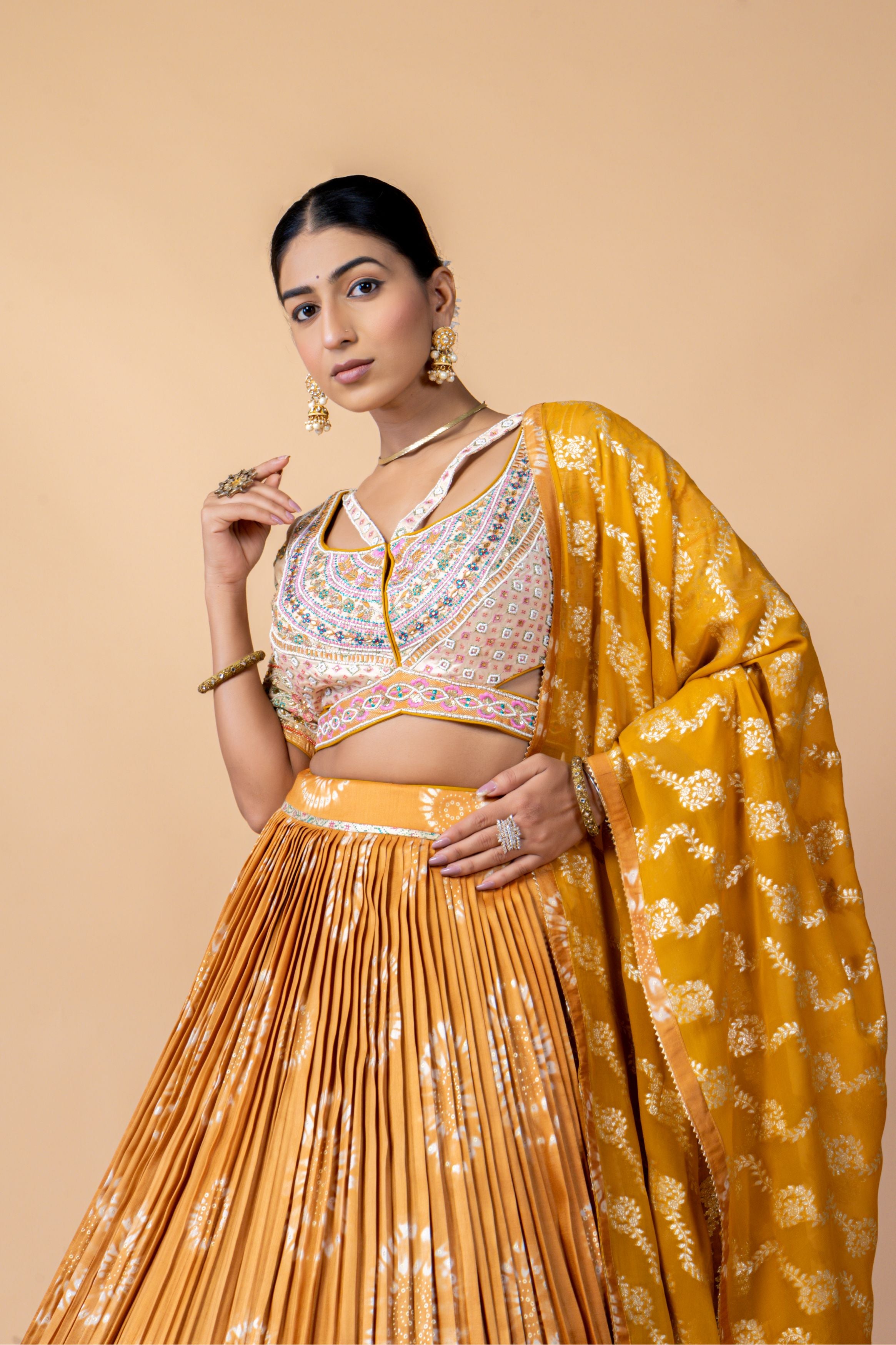 Mustard Embellished Brocade Silk Lehenga Set