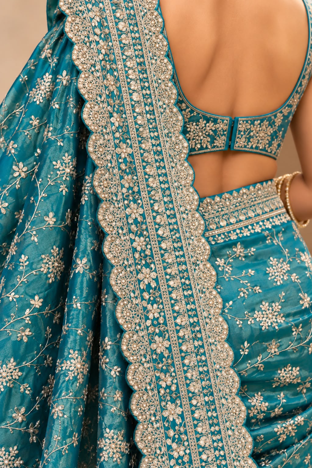 Aqua Blue Embellished Tissue Silk Saree