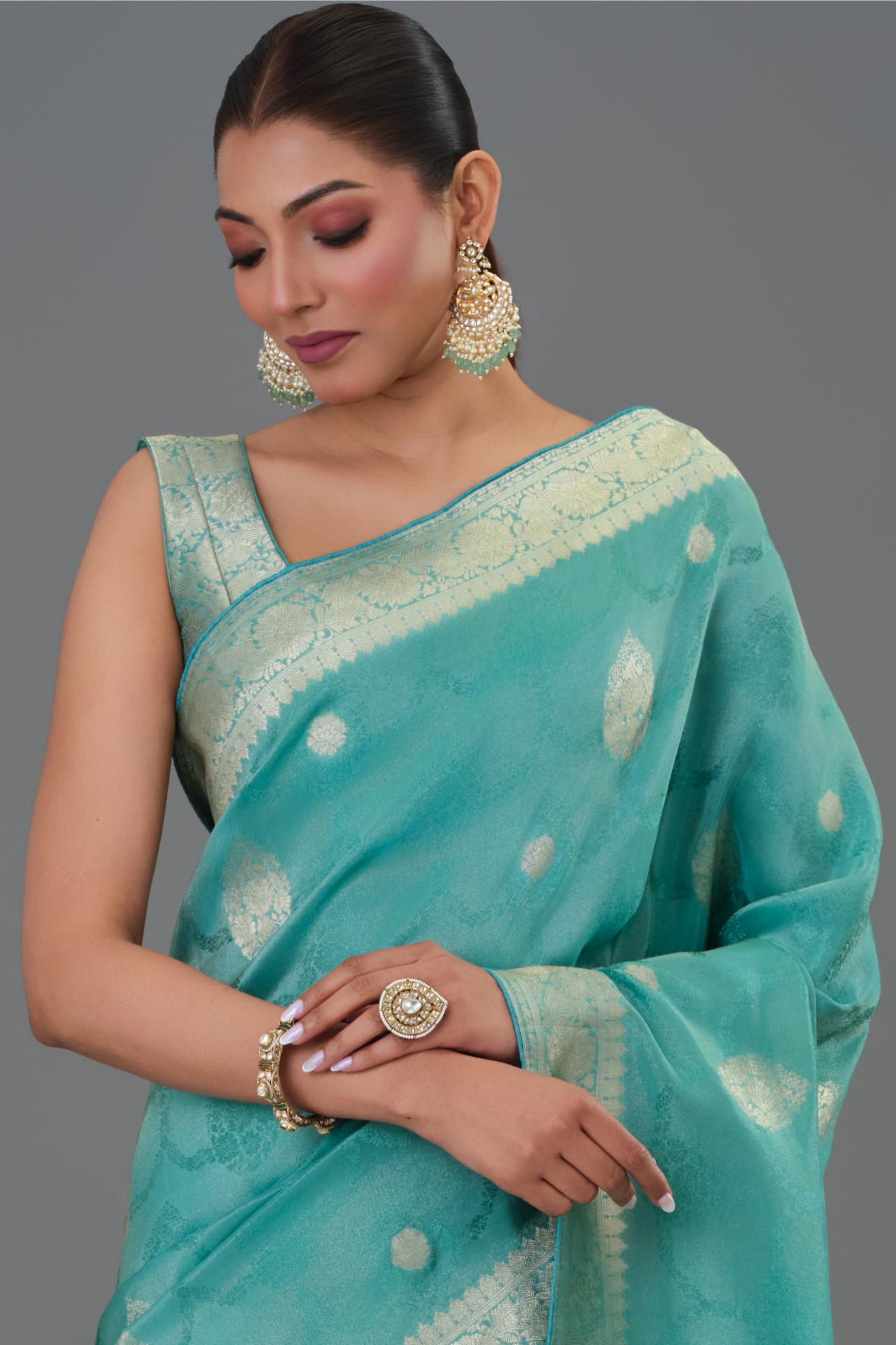 Teal Green Embroidered Dola Silk Saree