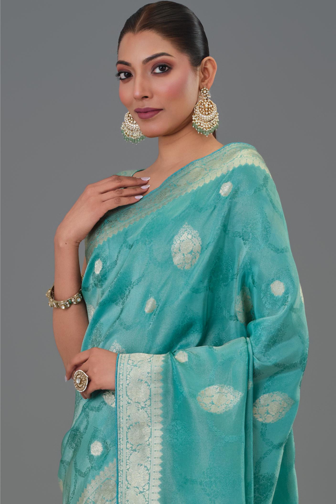 Teal Green Embroidered Dola Silk Saree