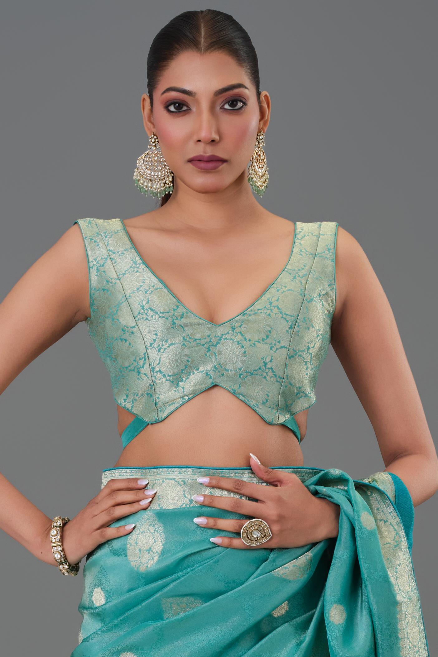Teal Green Embroidered Dola Silk Saree